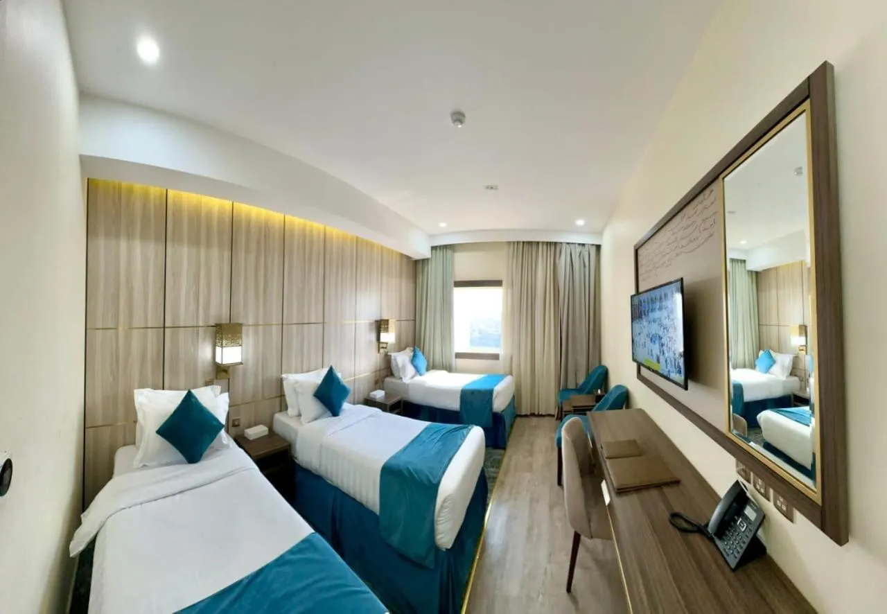 Bed in Al Ebaa Hotel