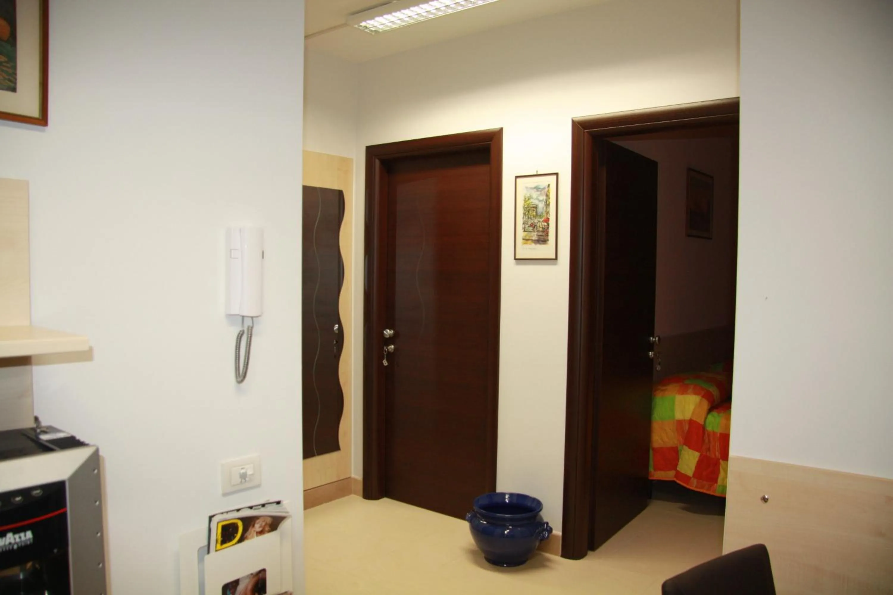 Communal lounge/ TV room in B&B Angolo Felice