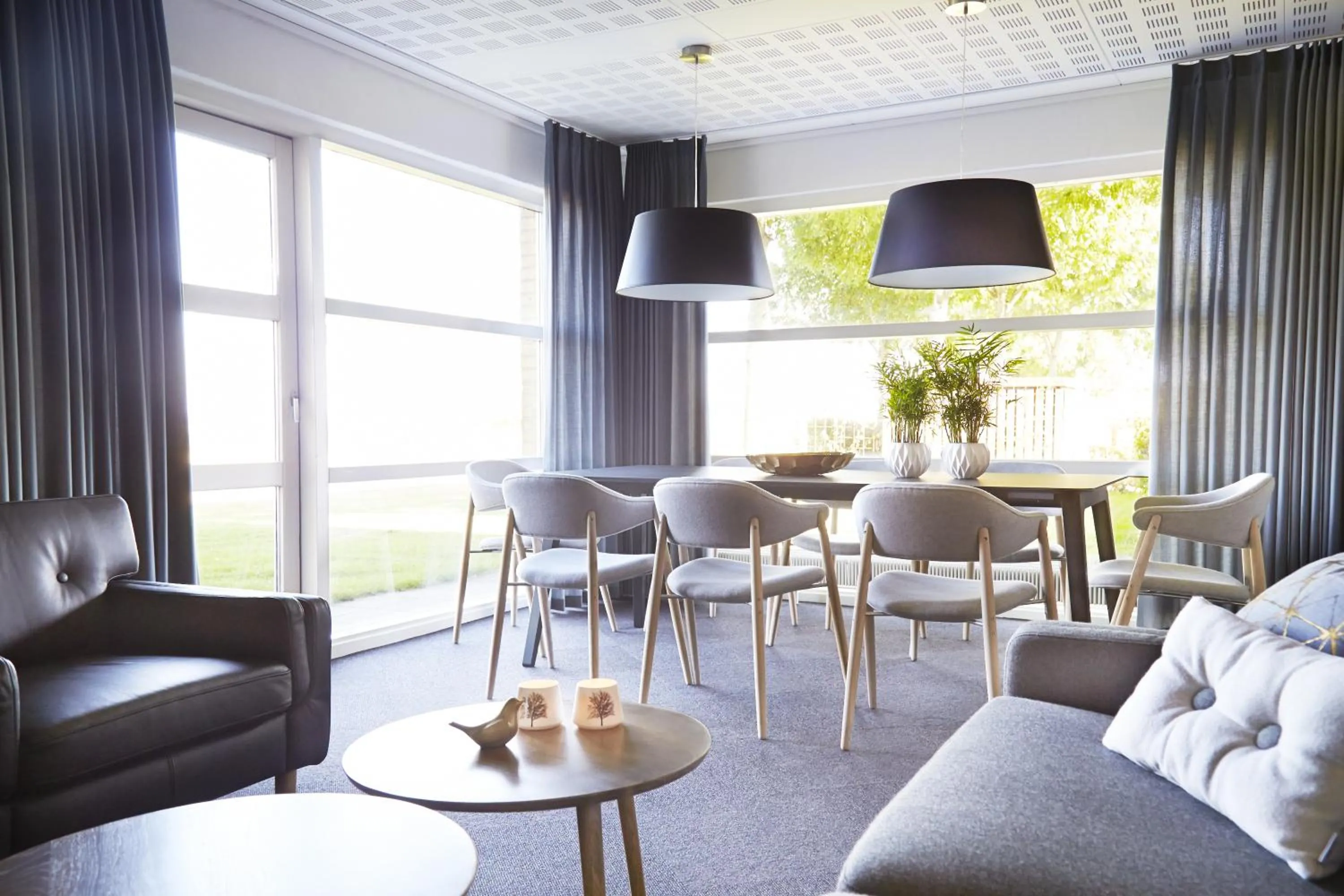 Communal lounge/ TV room in HORISONT Hotel & Konference