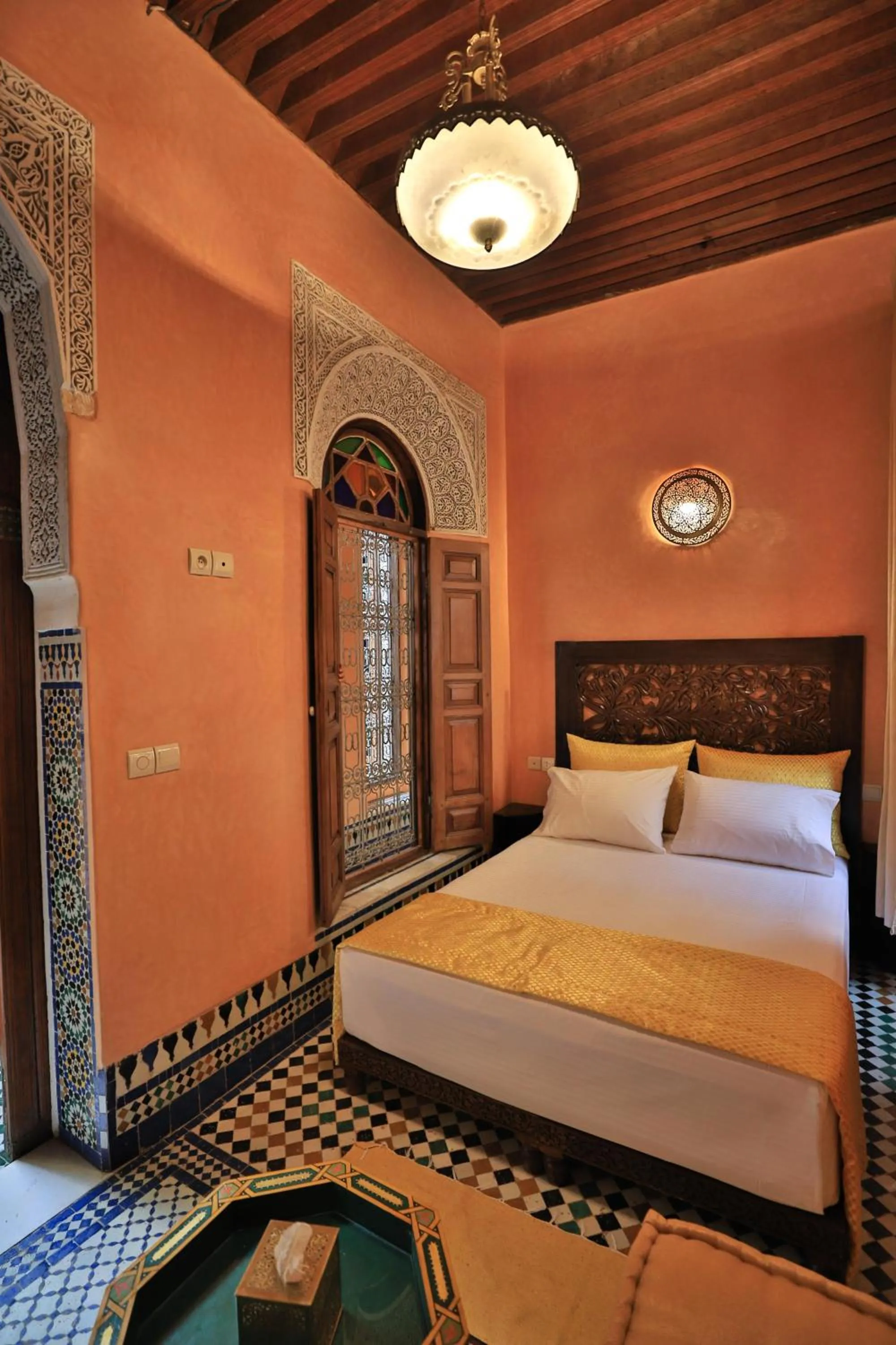 Bed in Riad Moulaydriss et Giacomo