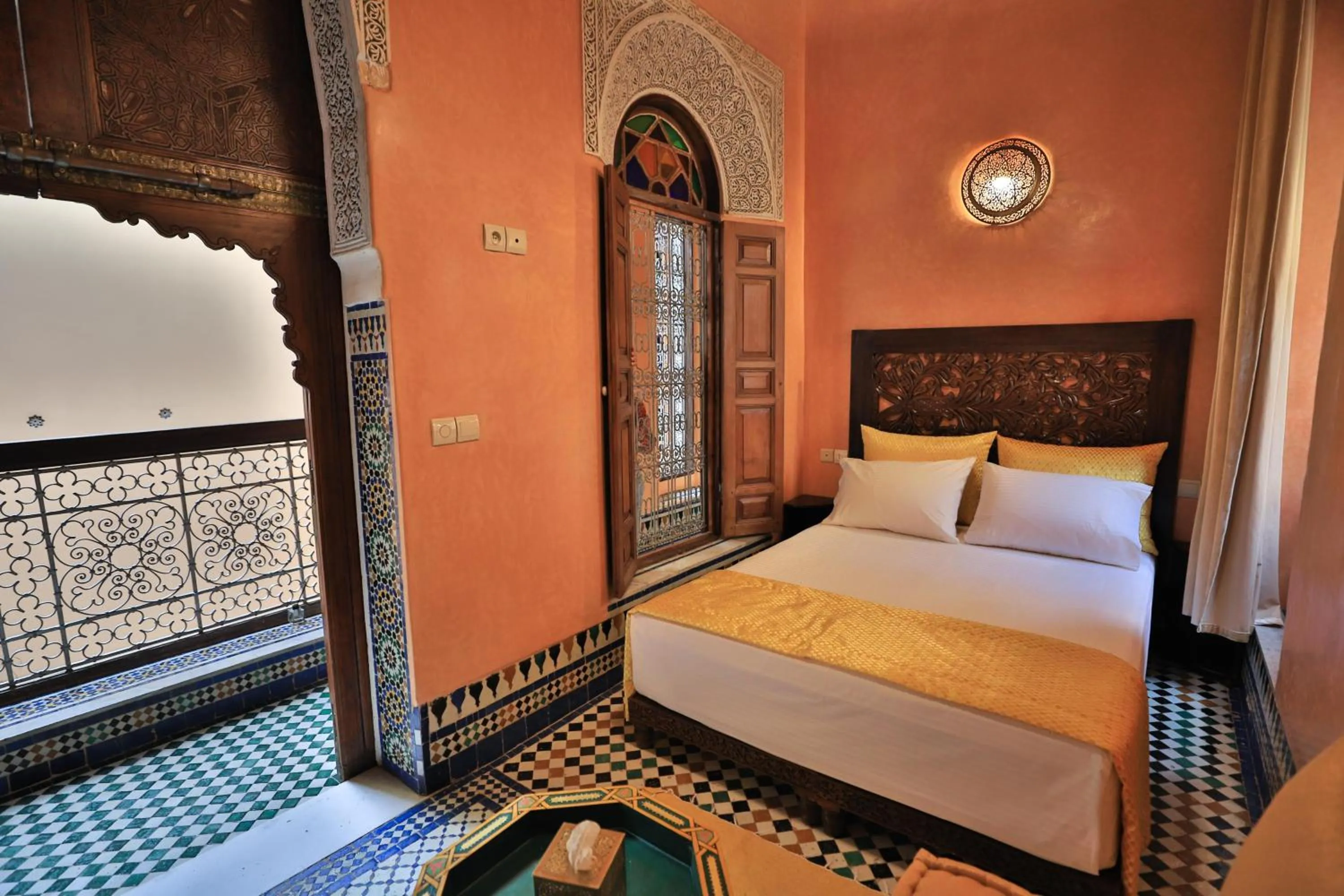 Bed in Riad Moulaydriss et Giacomo