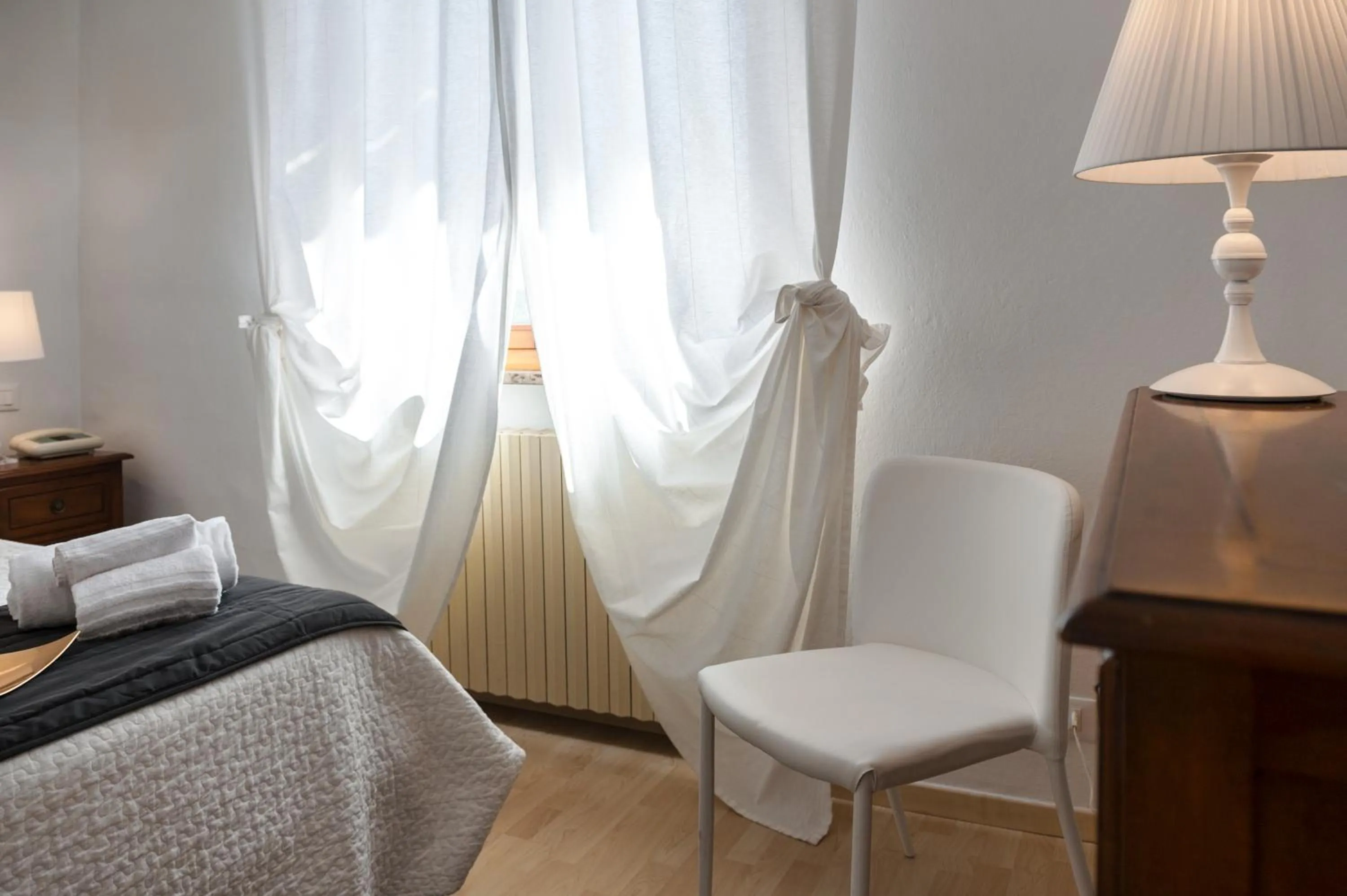 Bed in Hotel Porta Romana di Luce Hotels