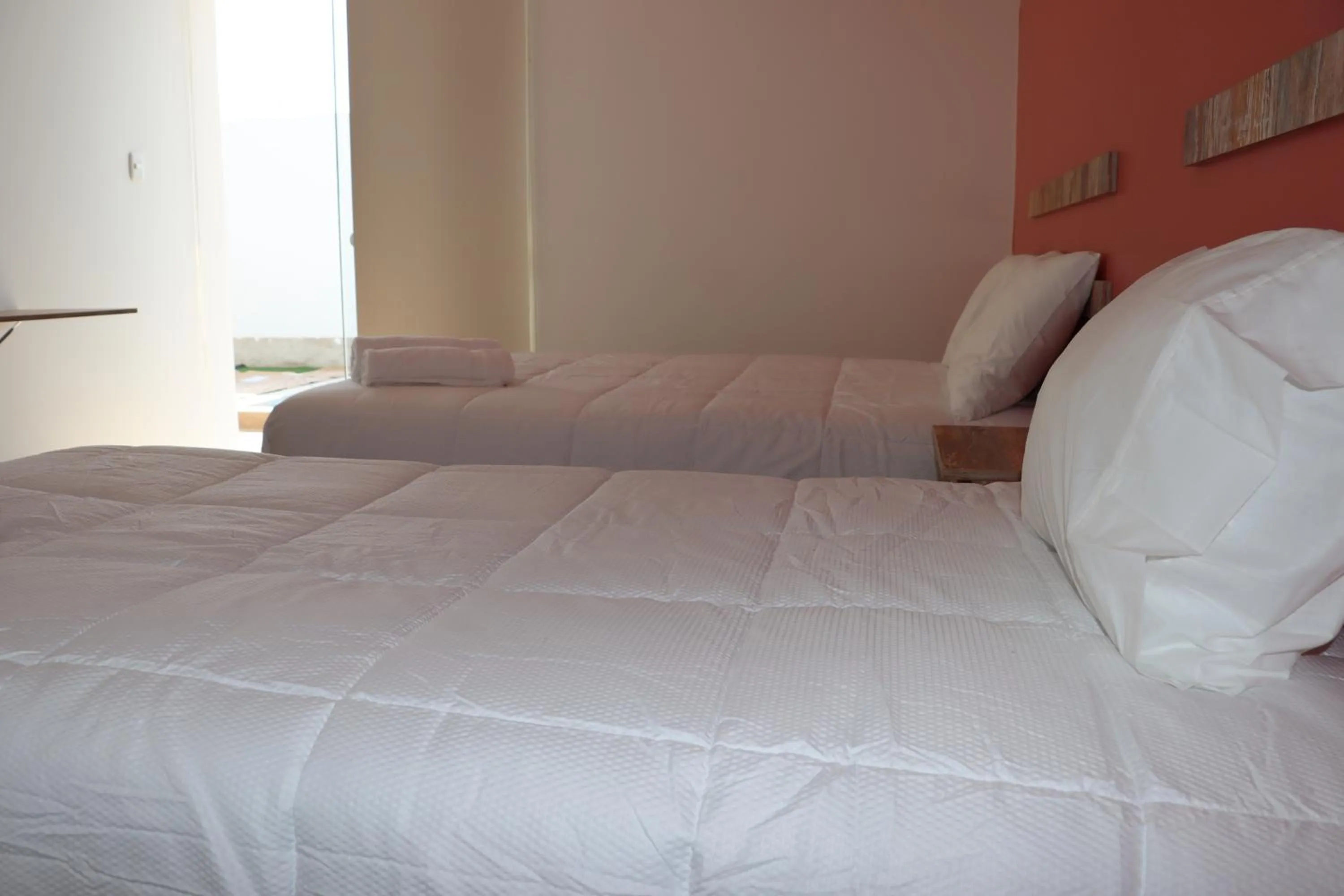 Bed in La Estancia Hotel Ica