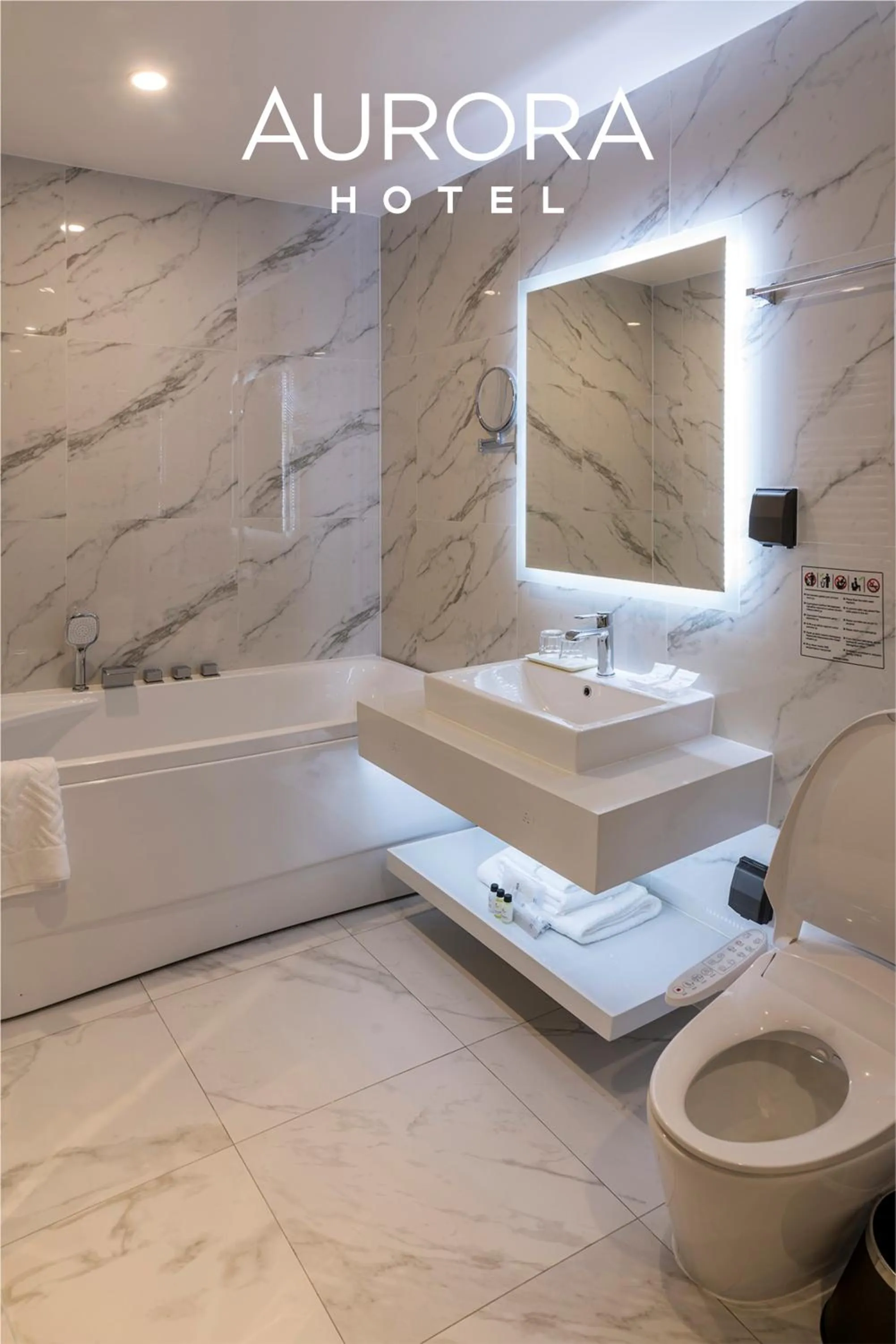 Toilet in Aurora Hotel