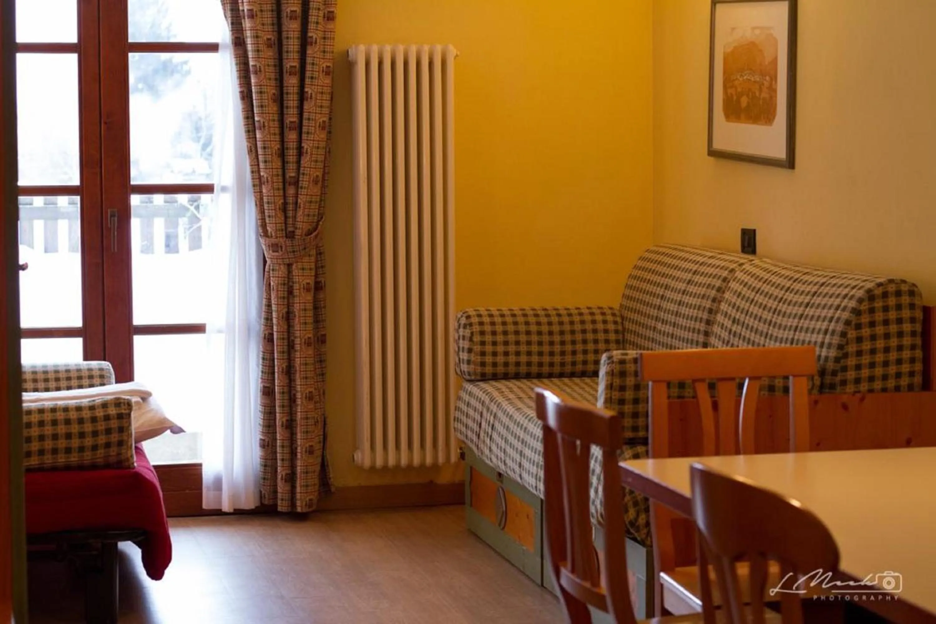 Living room in Nevesole Folgarida Resort Aparthotel