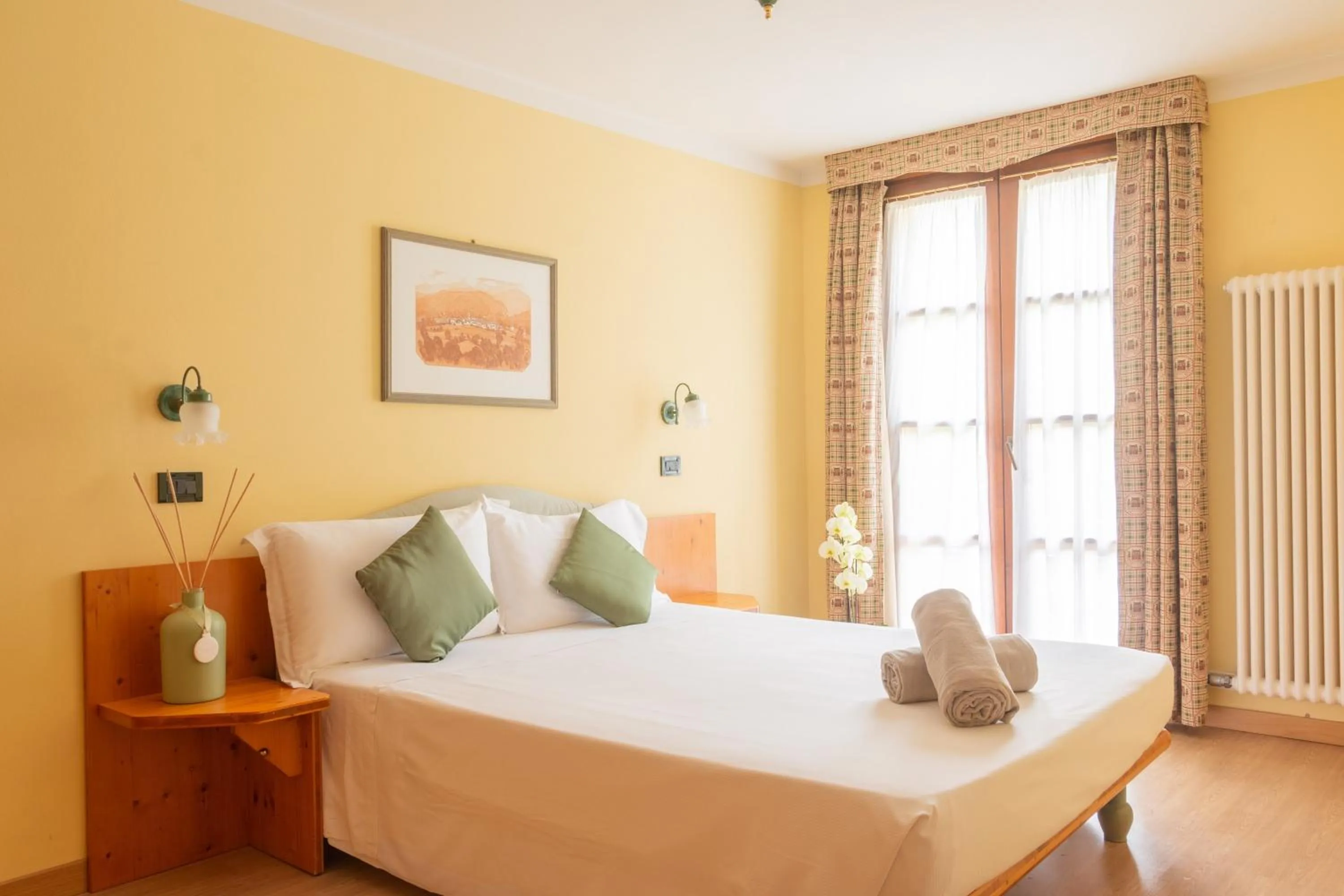 Bedroom, Bed in Nevesole Folgarida Resort Aparthotel