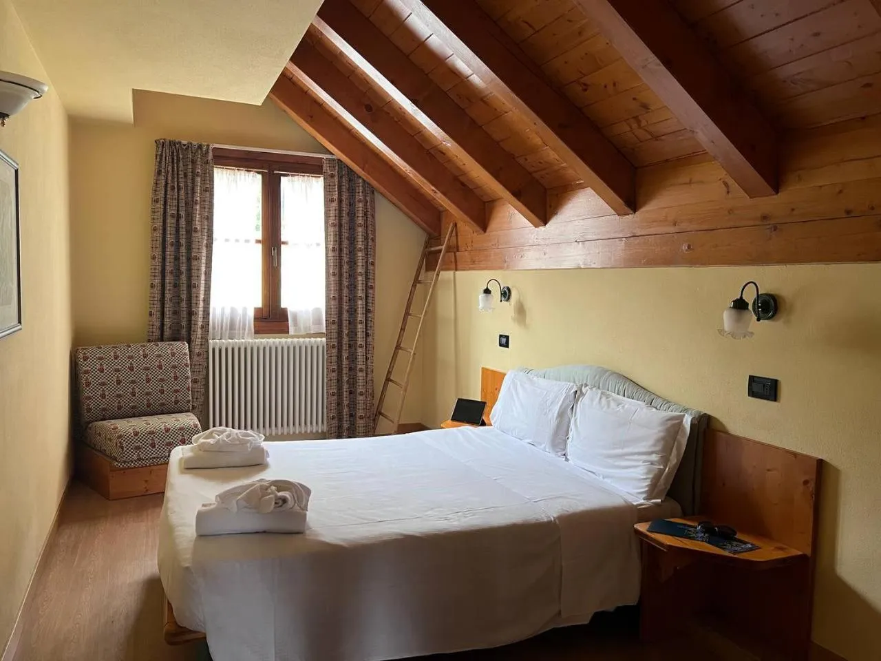 Bedroom, Bed in Nevesole Folgarida Resort Aparthotel