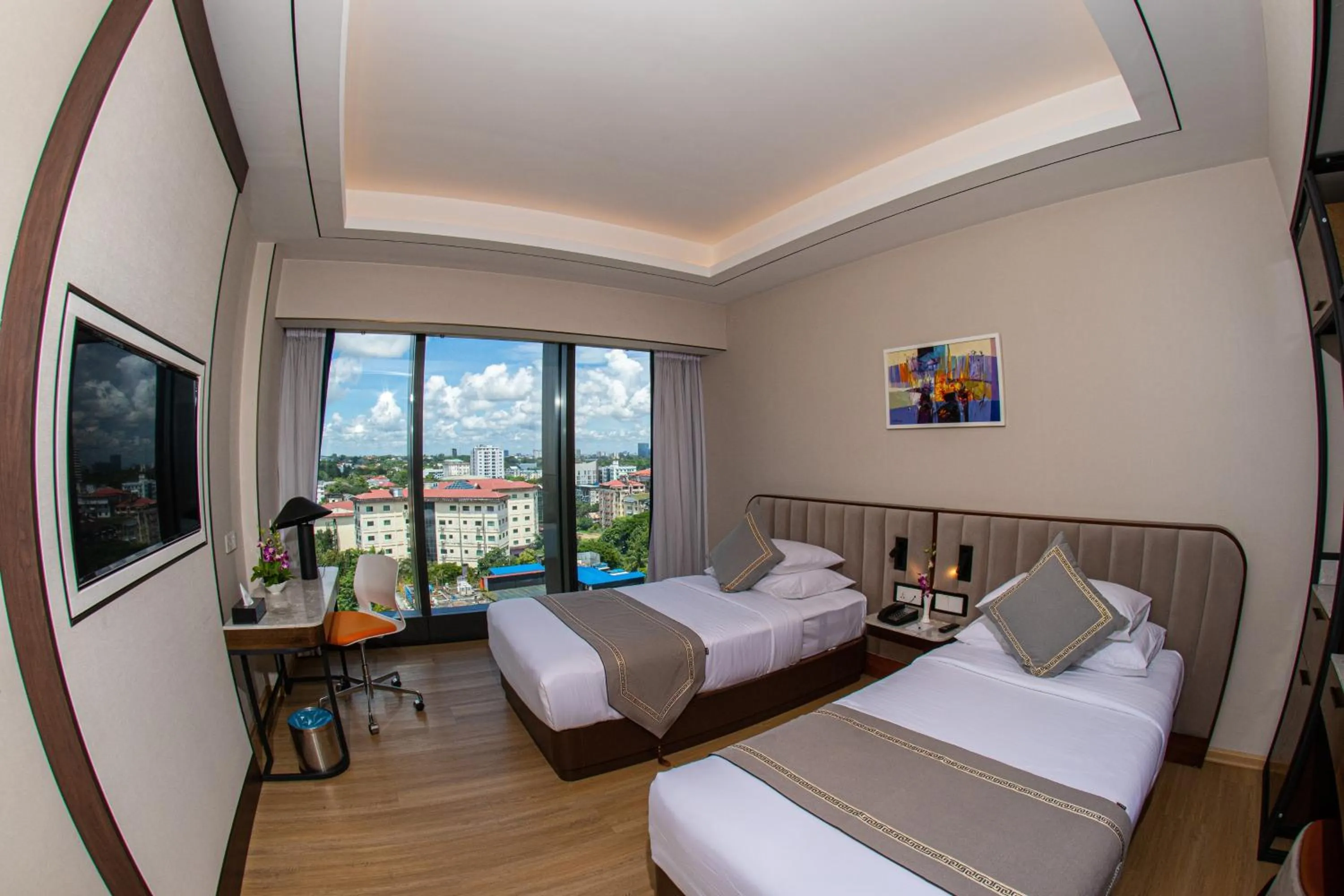 Bed in Sayarsan Hotel Yangon