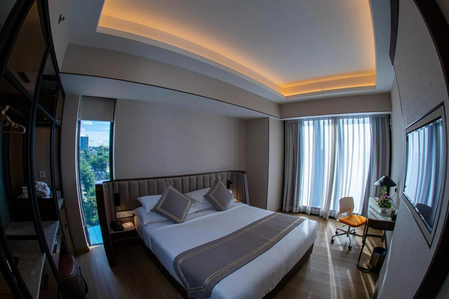 Bed in Sayarsan Hotel Yangon