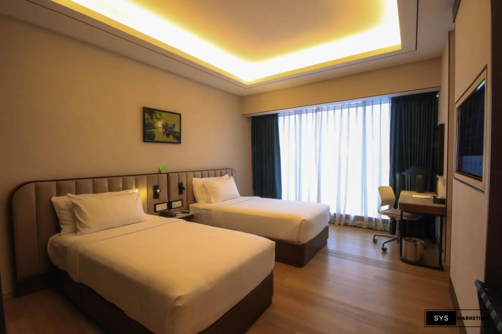 Bed in Sayarsan Hotel Yangon