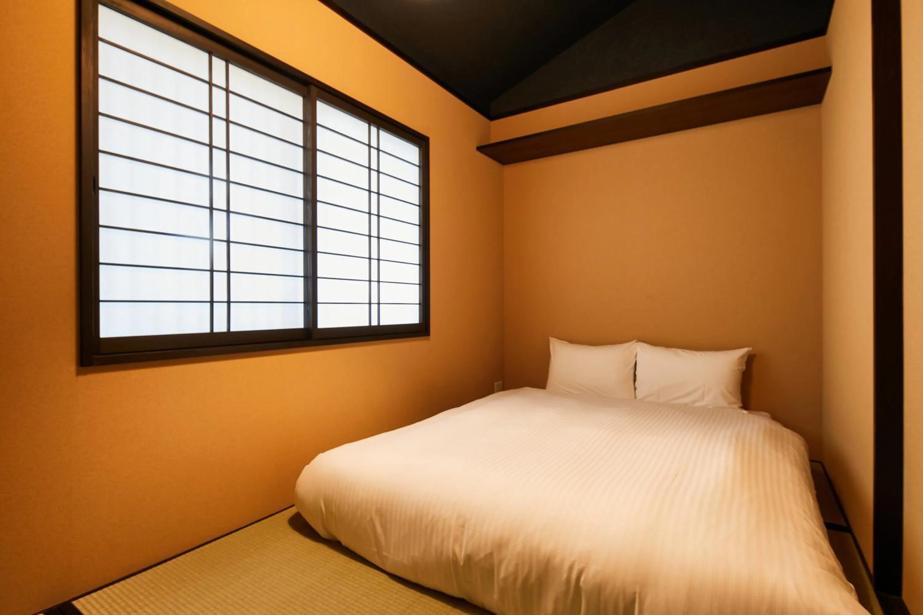 Bedroom, Bed in TSUBOMI luxury Inn Shimabara Bettei 1