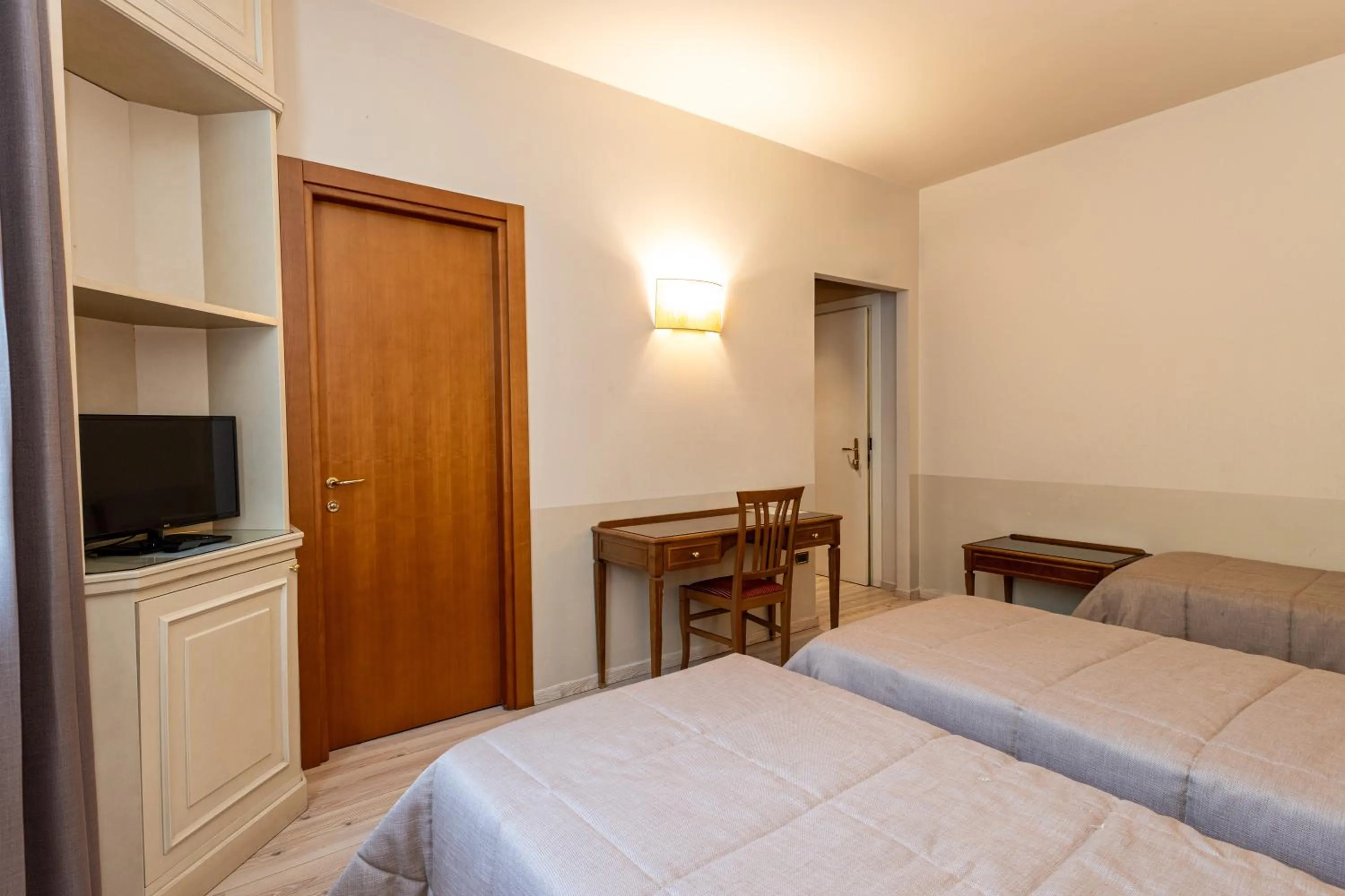 Bed in Hotel Valentino