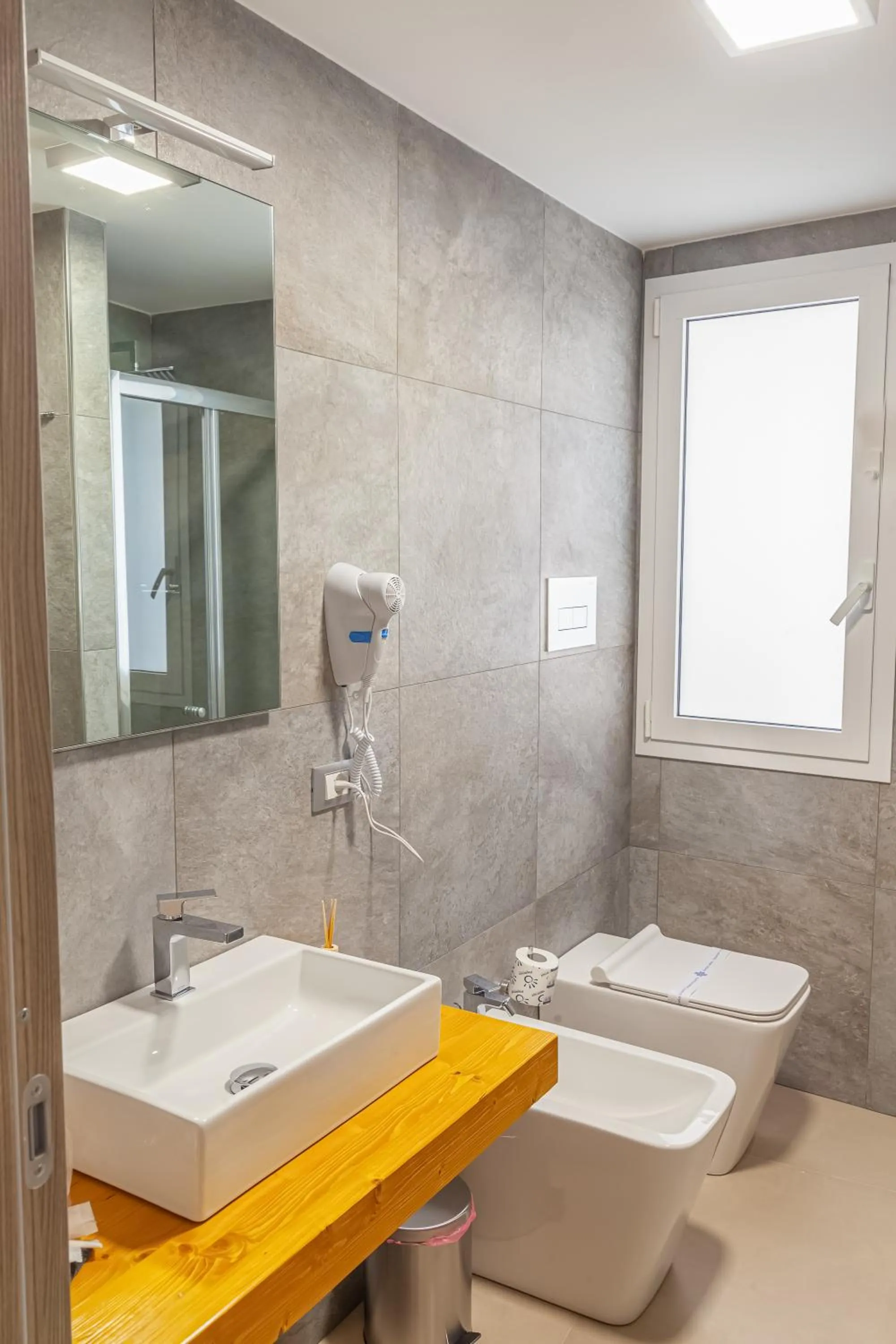 Bathroom in Isgrò Rooms