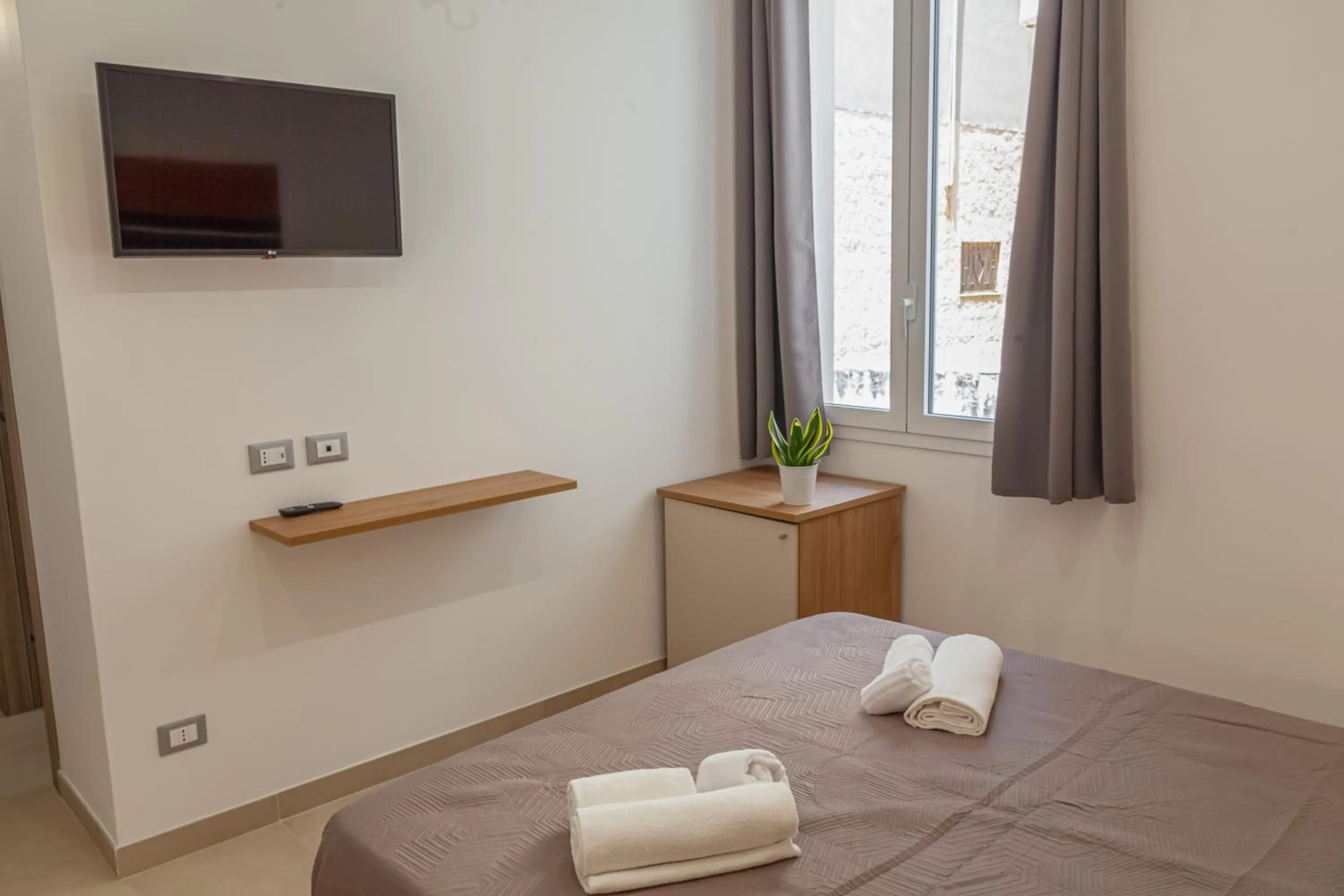 Bedroom, Bed in Isgrò Rooms