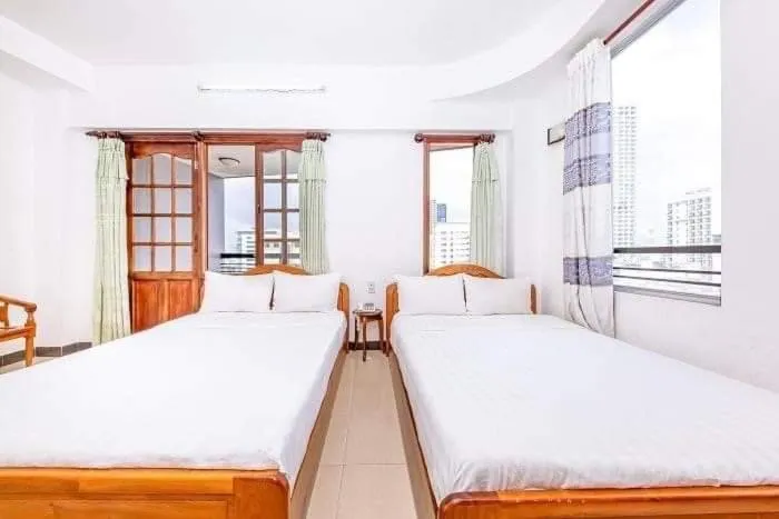 Bed in Minh Cat Hotel