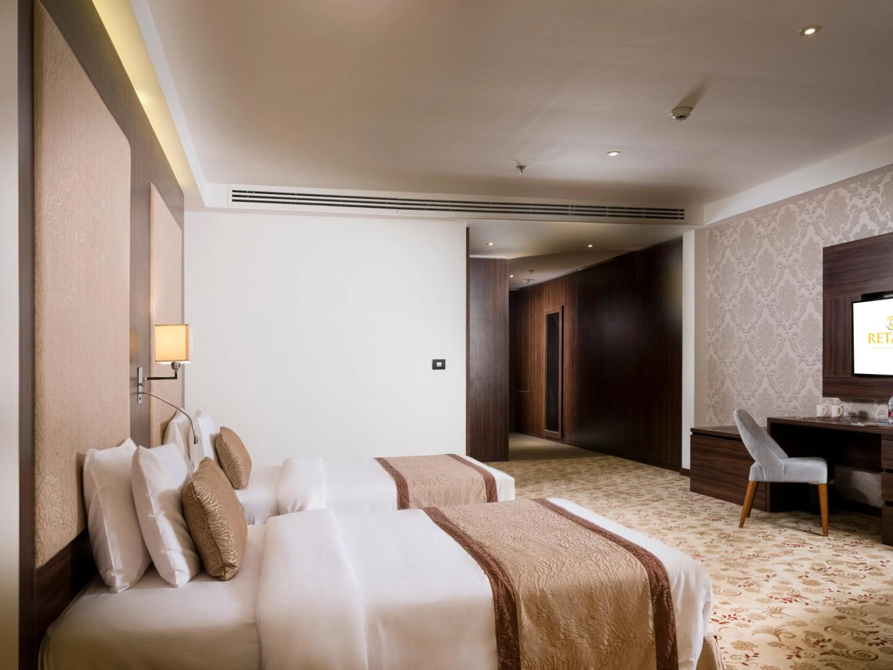 Photo of the whole room, Bed in Retaj Inn Al Wakrah