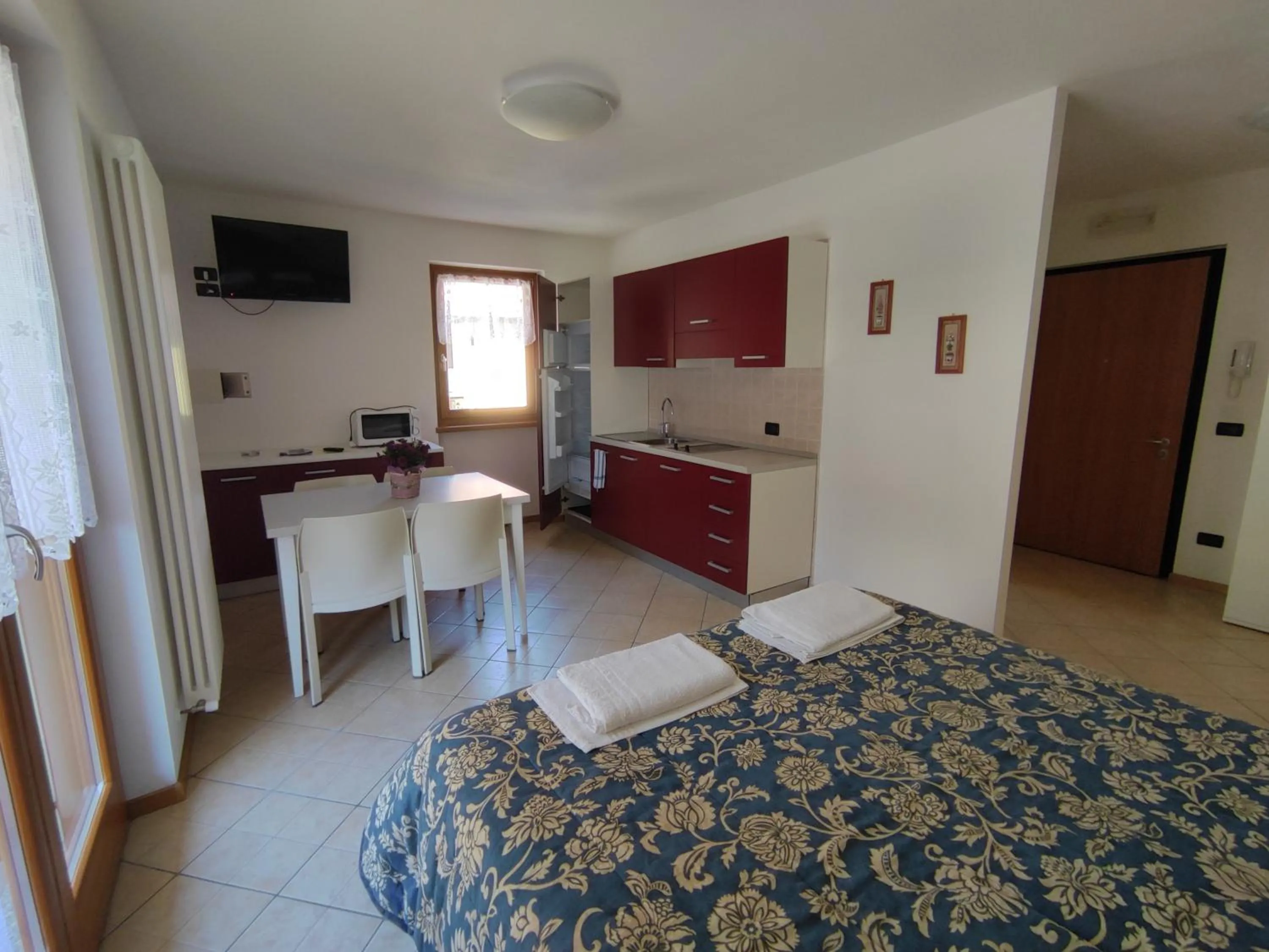 Kitchen or kitchenette, Bed in Residenza Arcobaleno