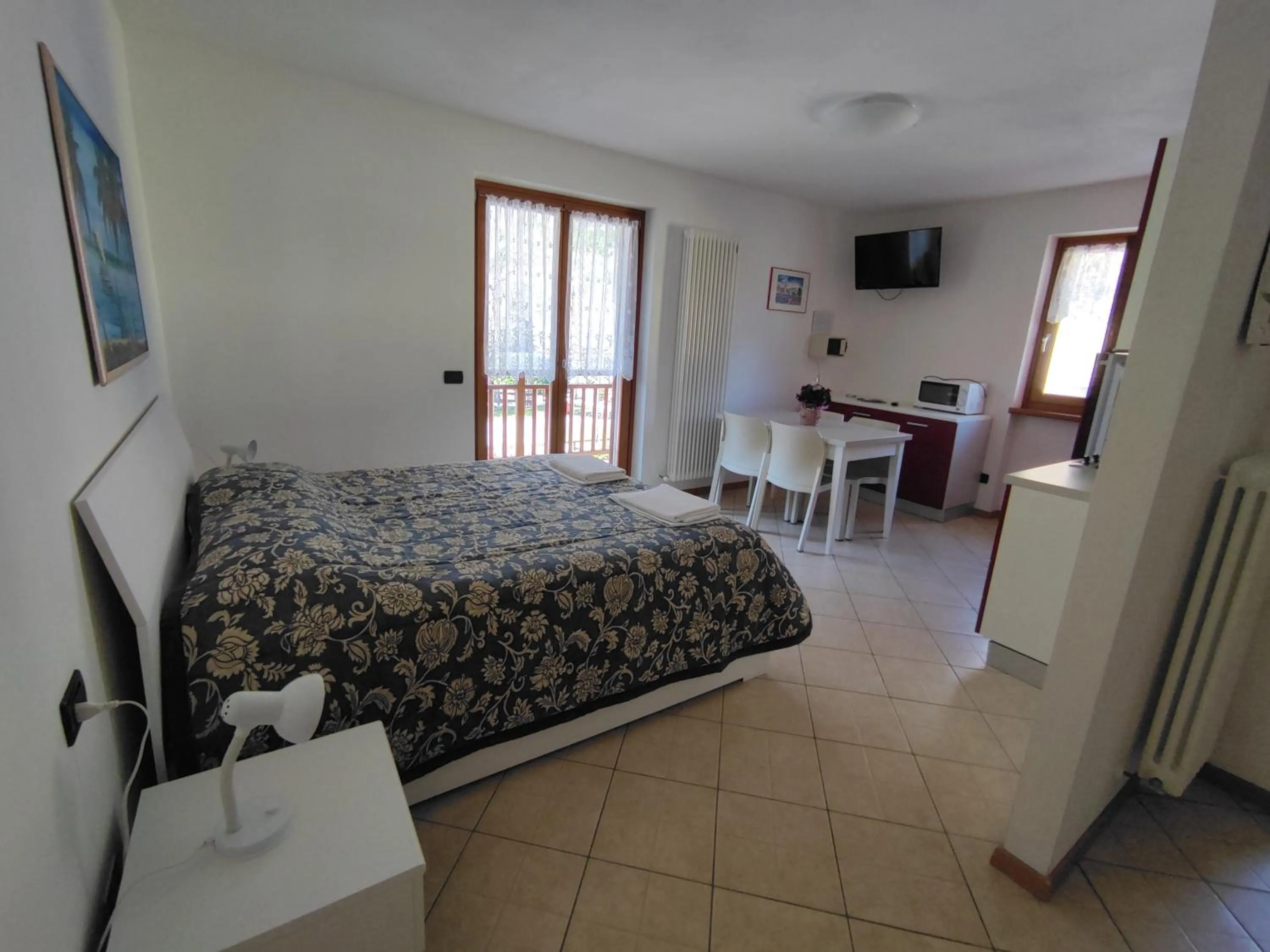 Living room, Bed in Residenza Arcobaleno