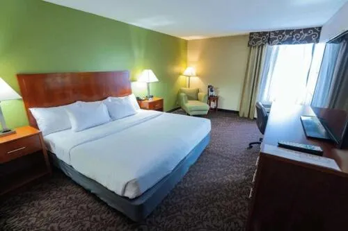 Bed in Quality Inn & Suites Downtown Mansfield