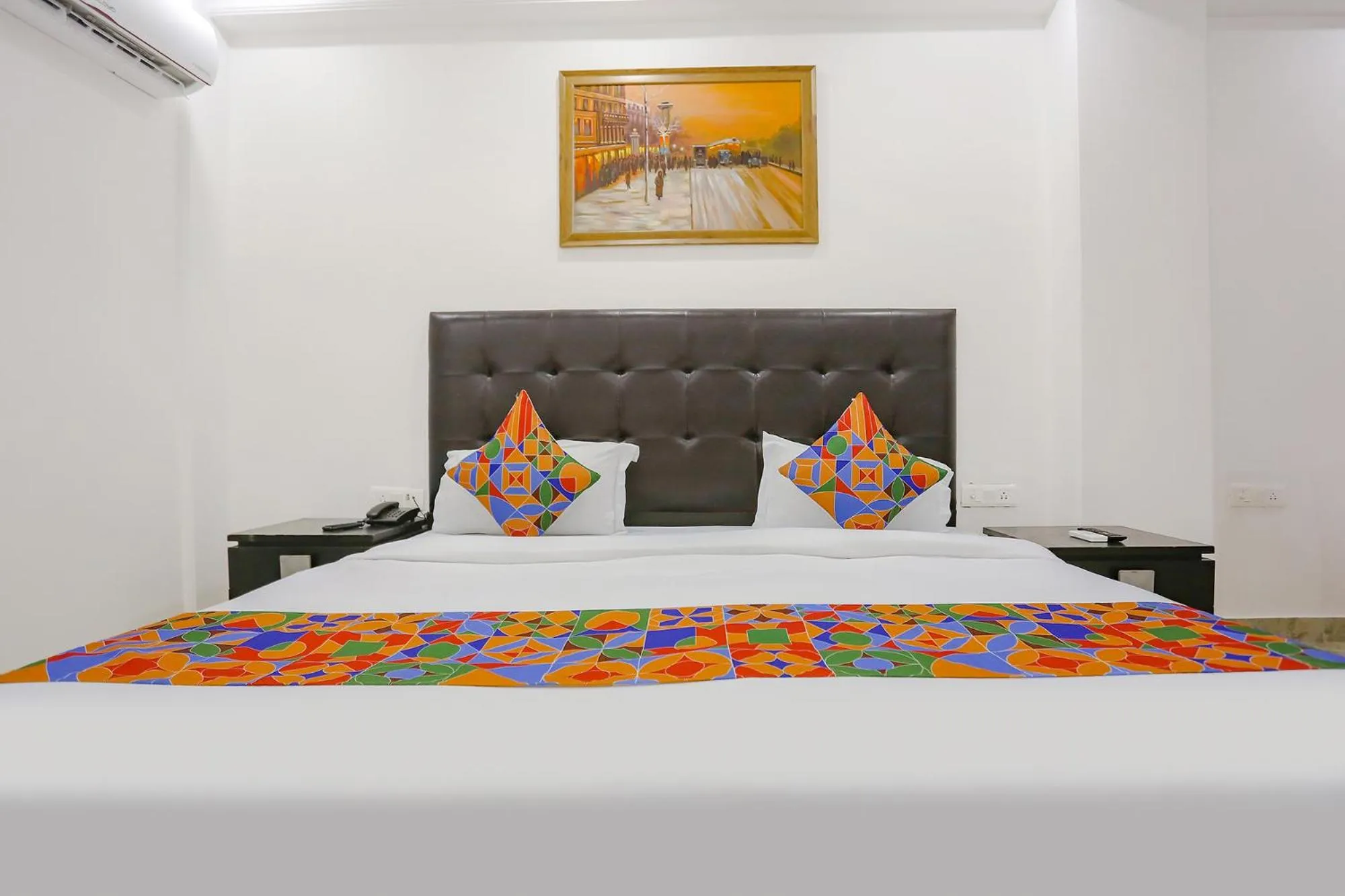 Bed in FabHotel Taj Residency