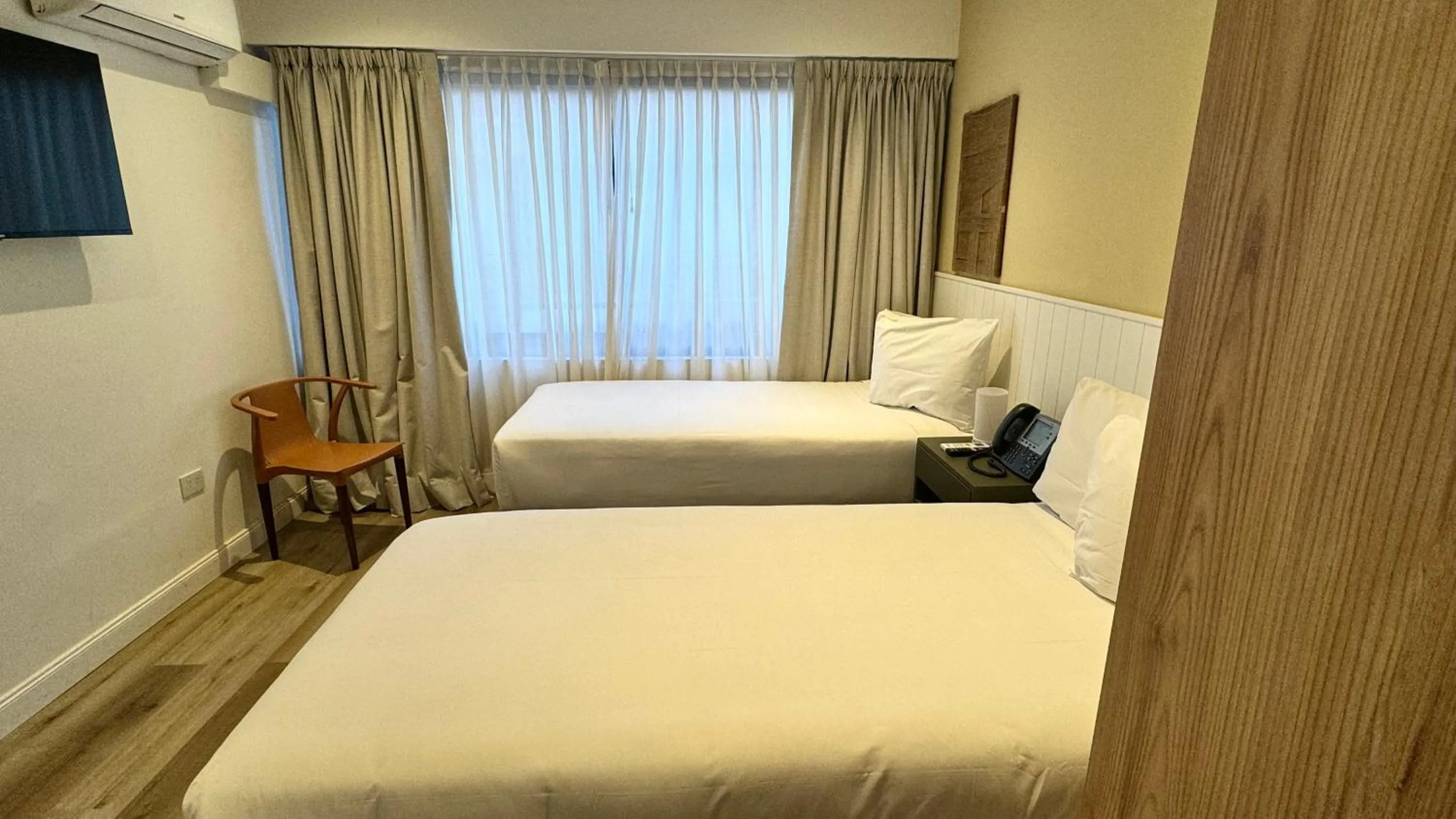 Bed in Gardi Hotel & Suites