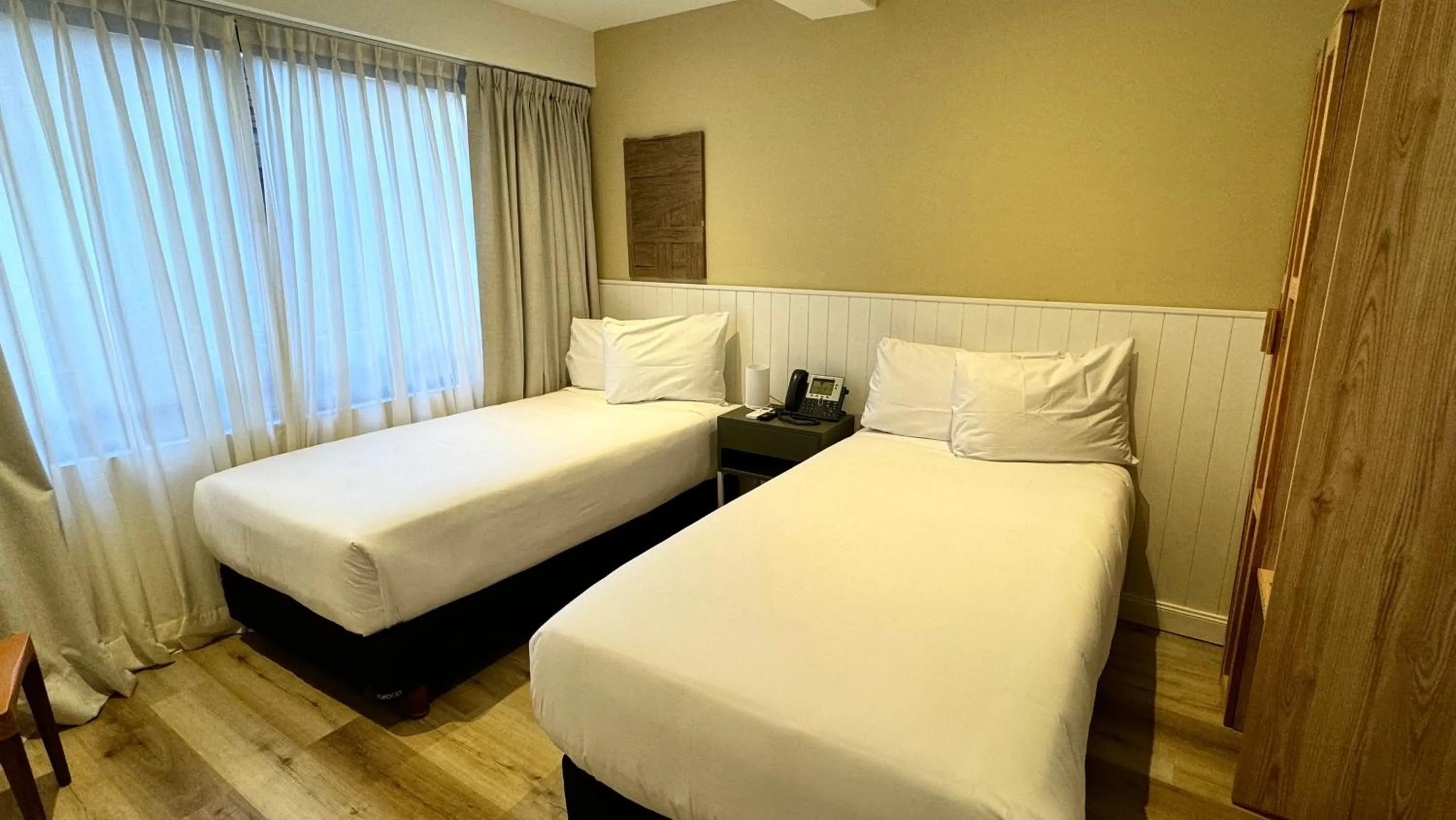 Bed in Gardi Hotel & Suites