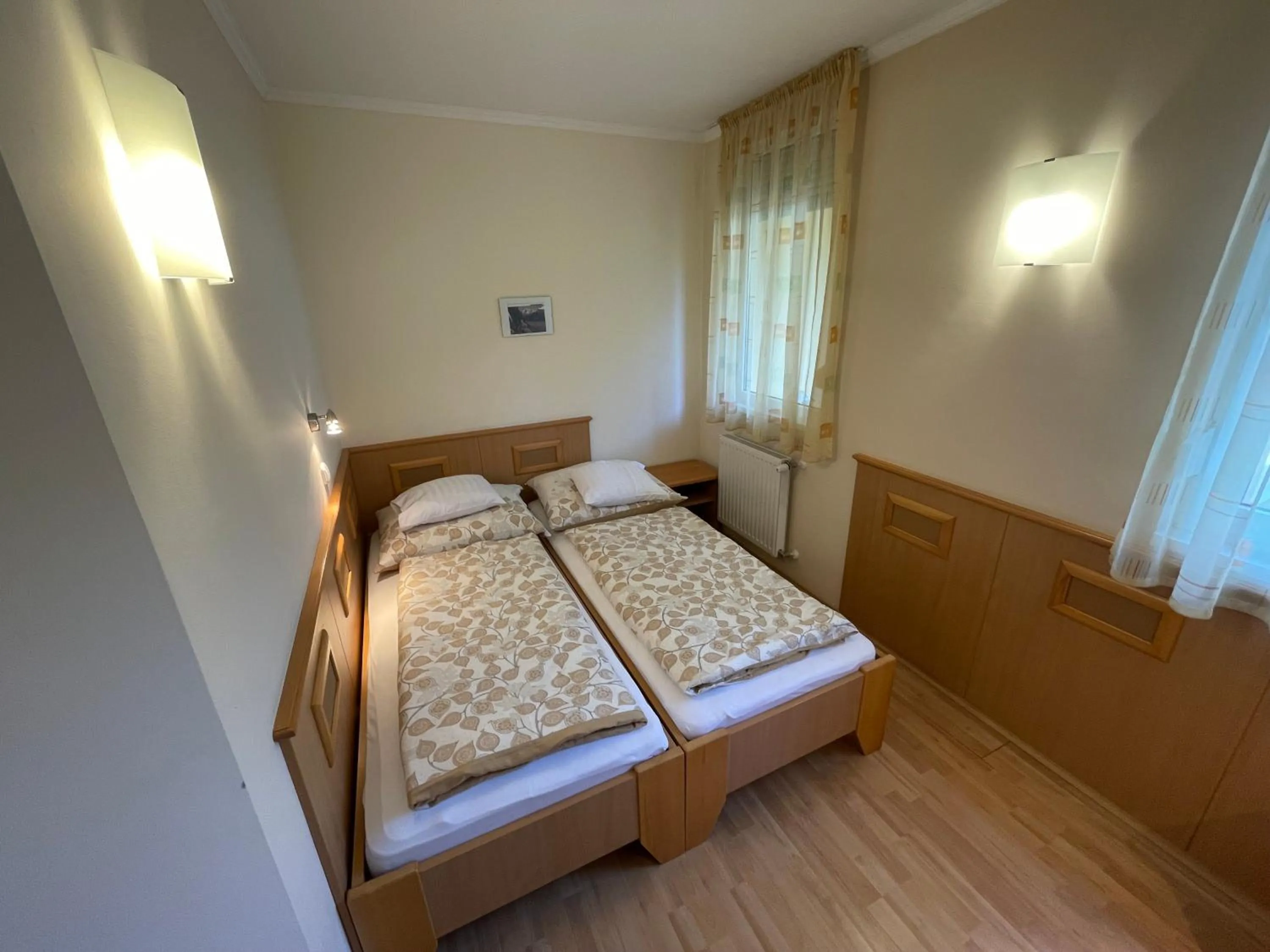 Bed in Garda Wellness Apartmanház