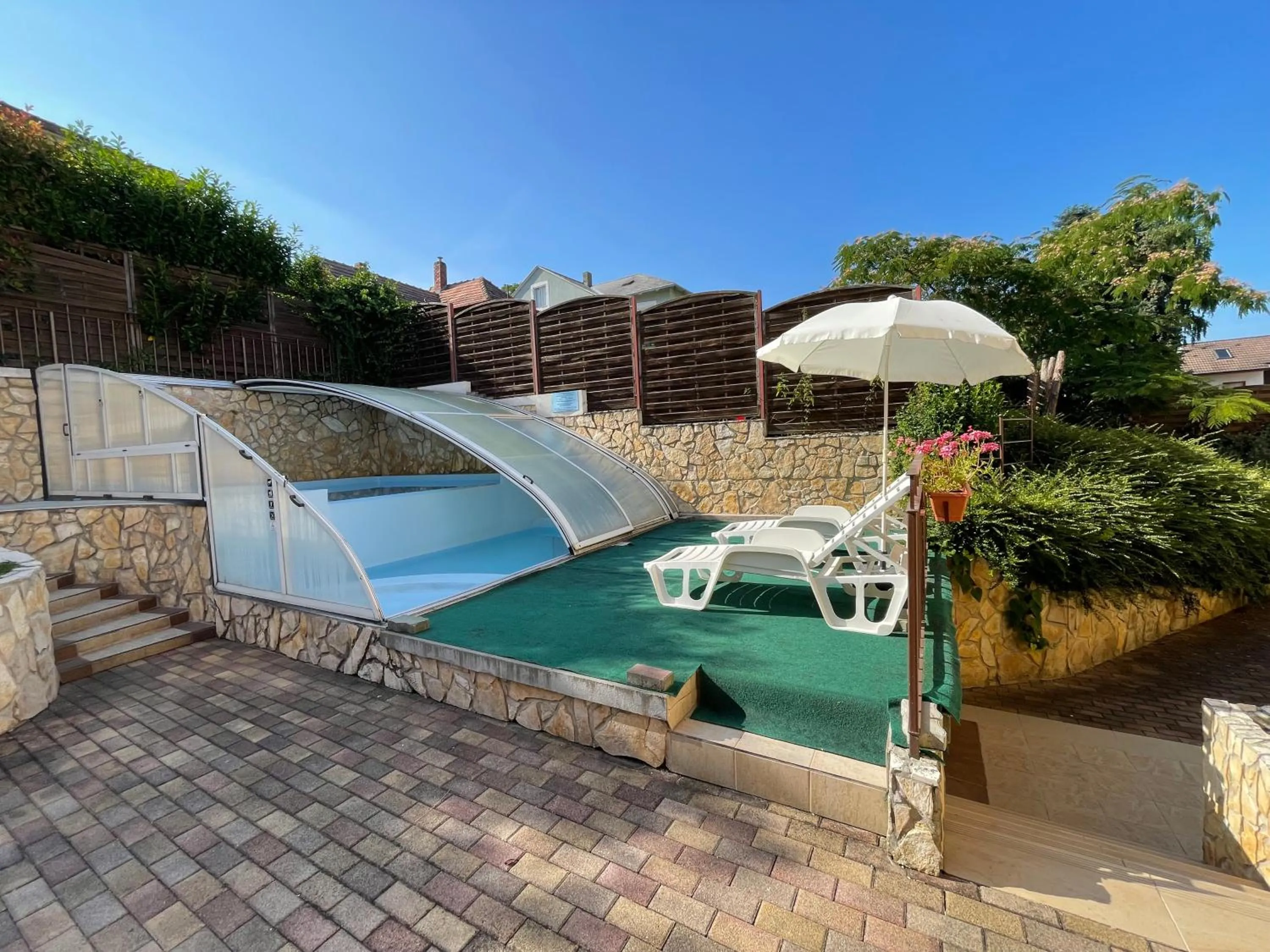 Pool view in Garda Wellness Apartmanház