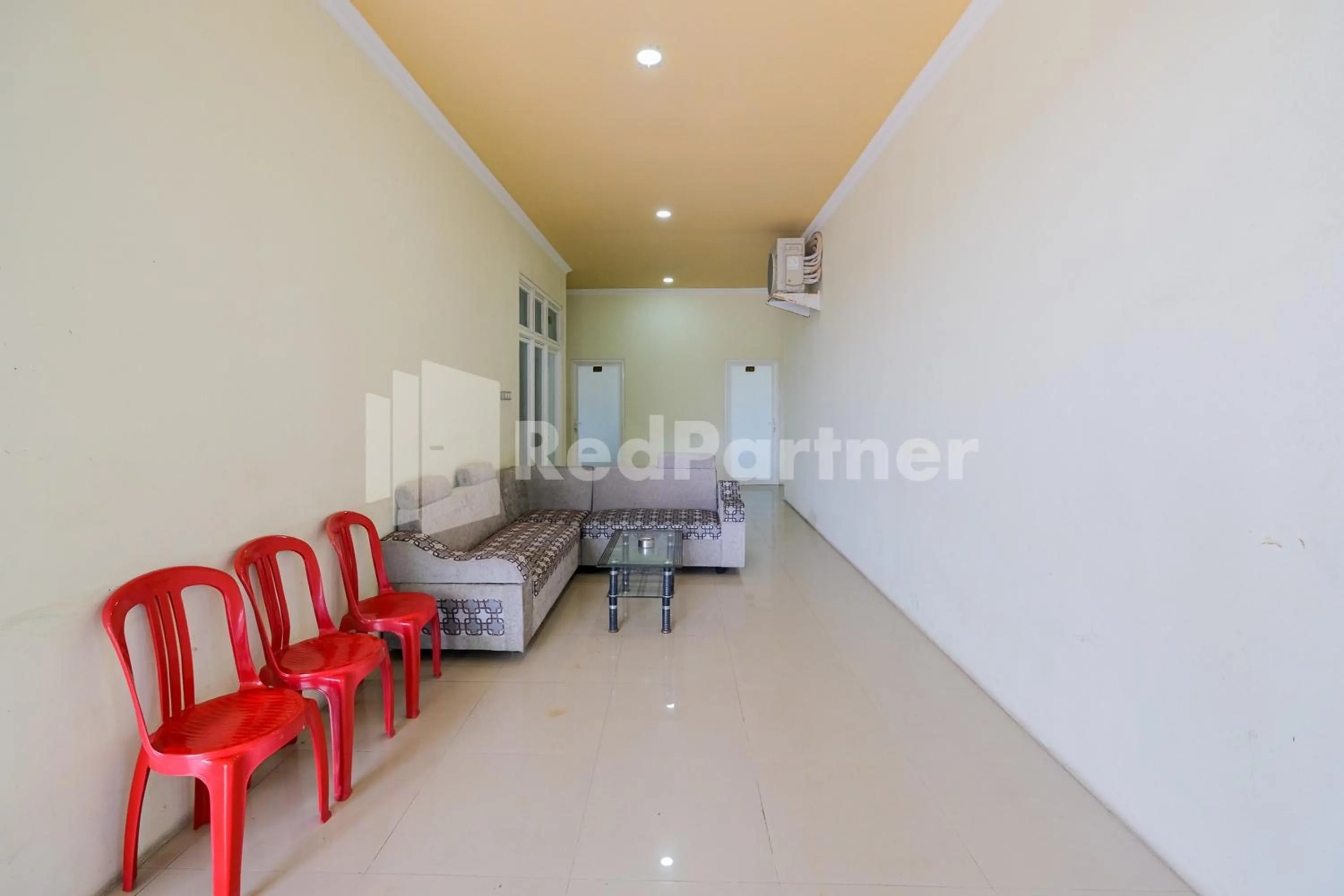 Seating area in Grand Kencana Guesthouse Syariah near Wisata Bahari Lamongan