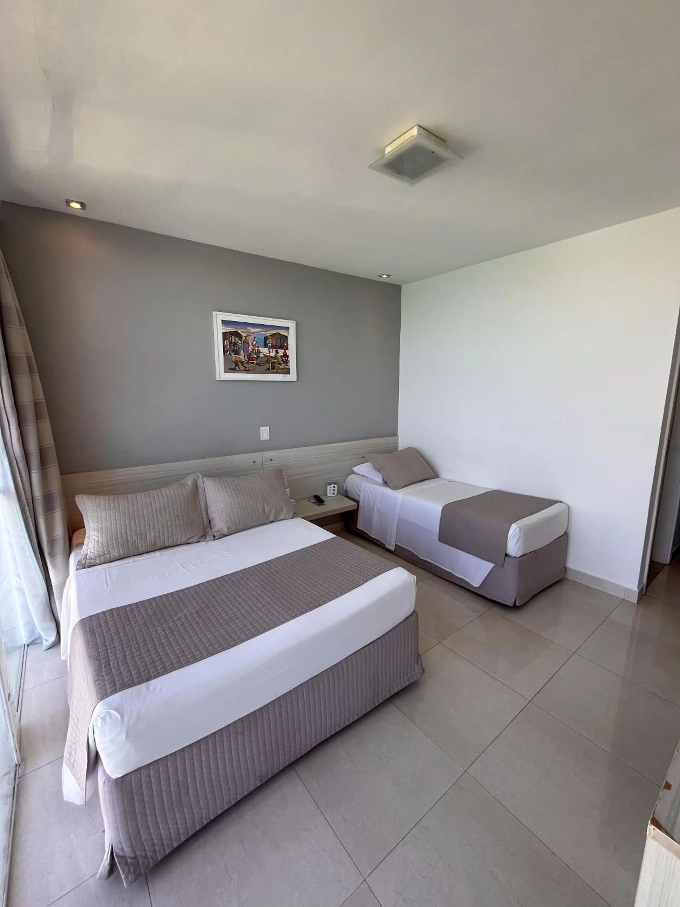 Bed in Grand Hotel Guarujá - A sua Melhor Experiência Beira Mar na Praia!