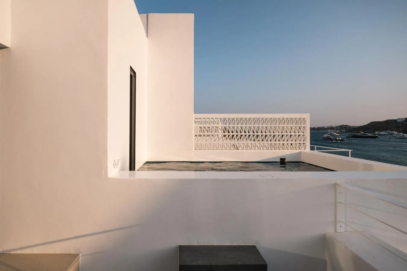 Pool view in CUBIC Mykonos Seafront Design Suites