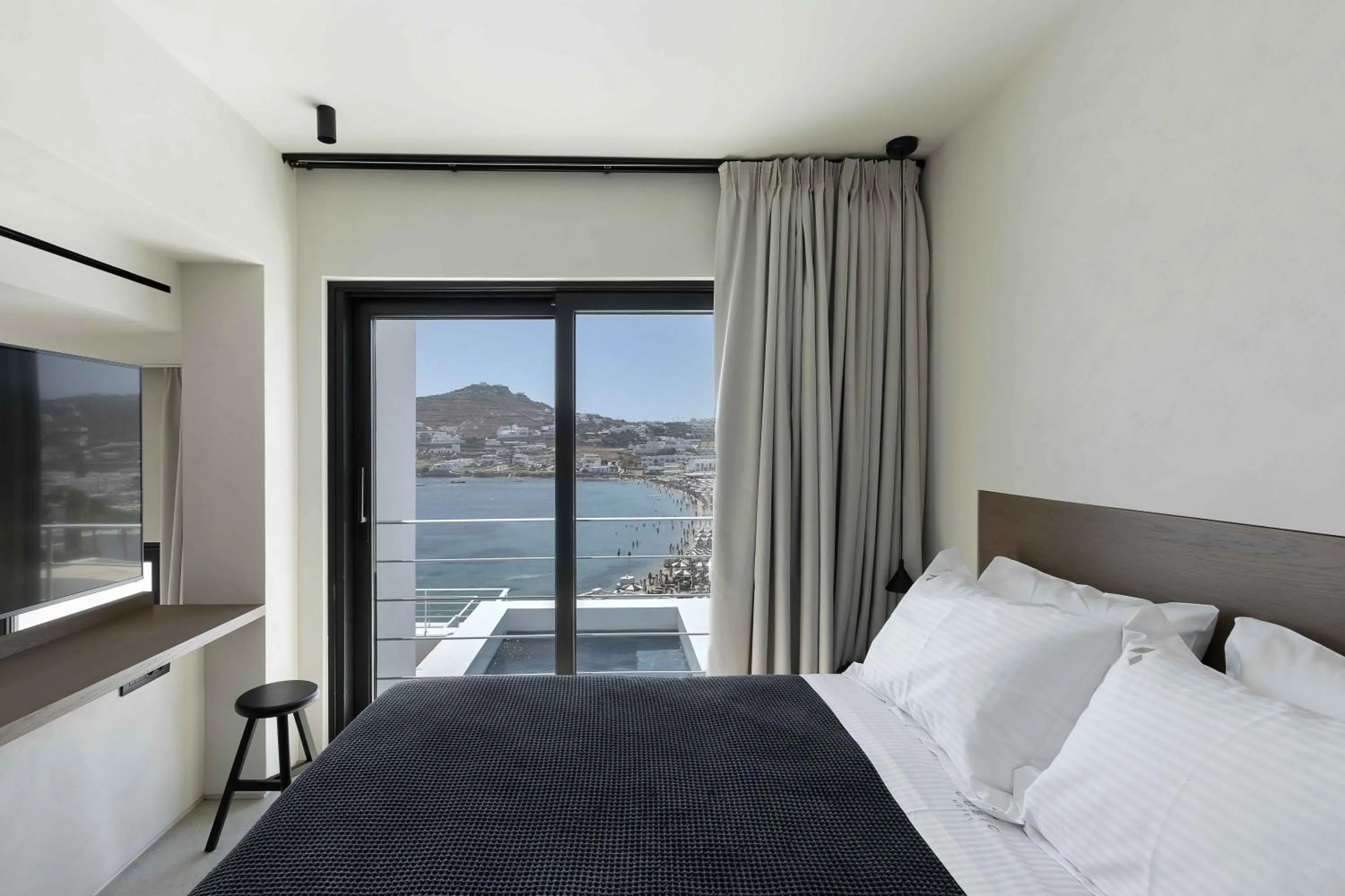 TV and multimedia, Bed in CUBIC Mykonos Seafront Design Suites