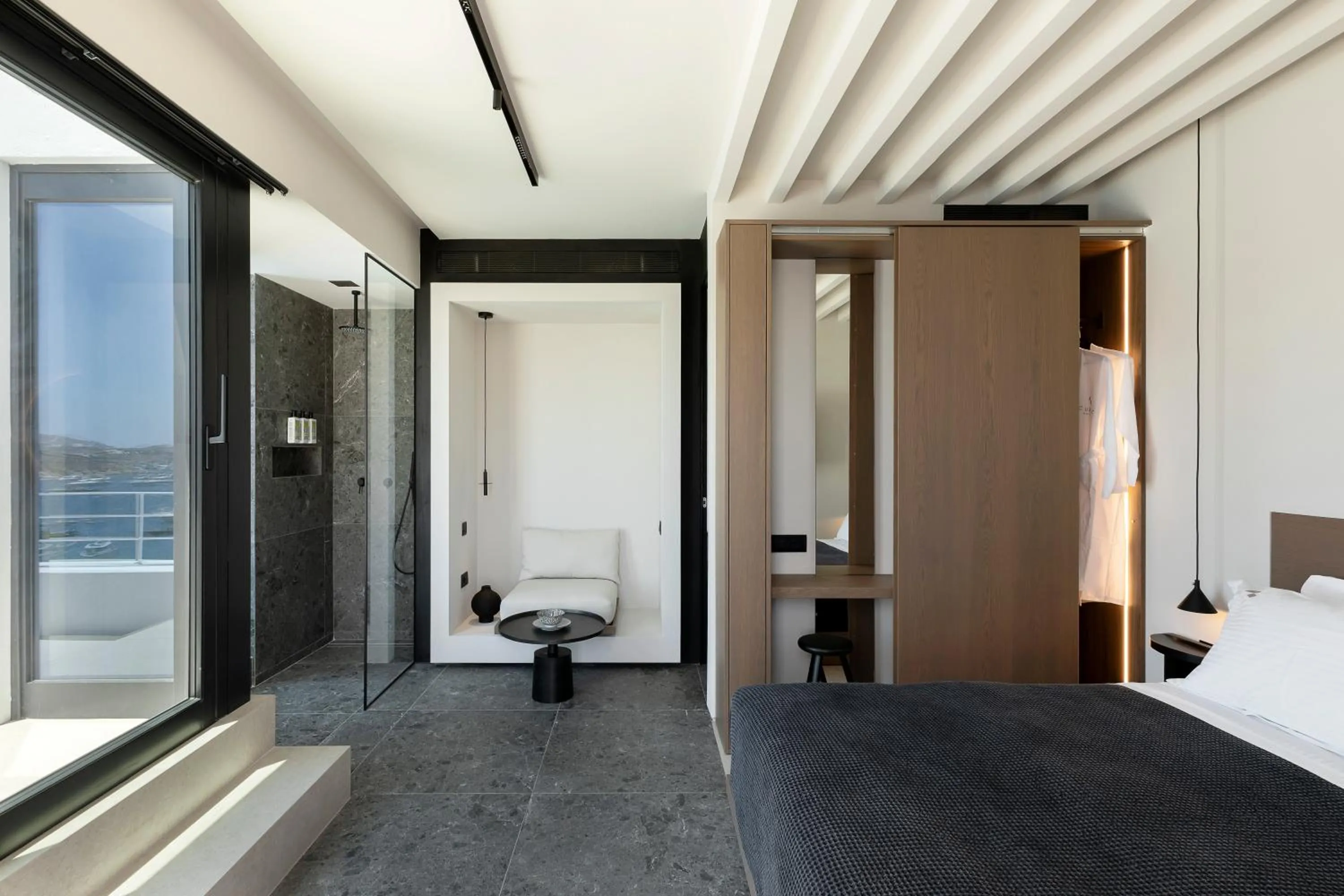 Photo of the whole room, Bed in CUBIC Mykonos Seafront Design Suites