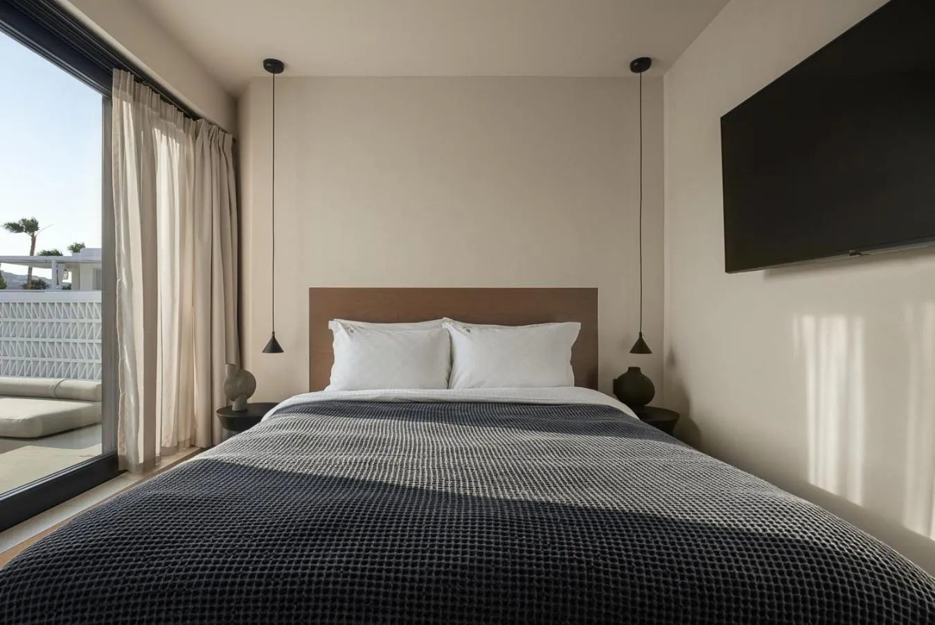 Bed in CUBIC Mykonos Seafront Design Suites