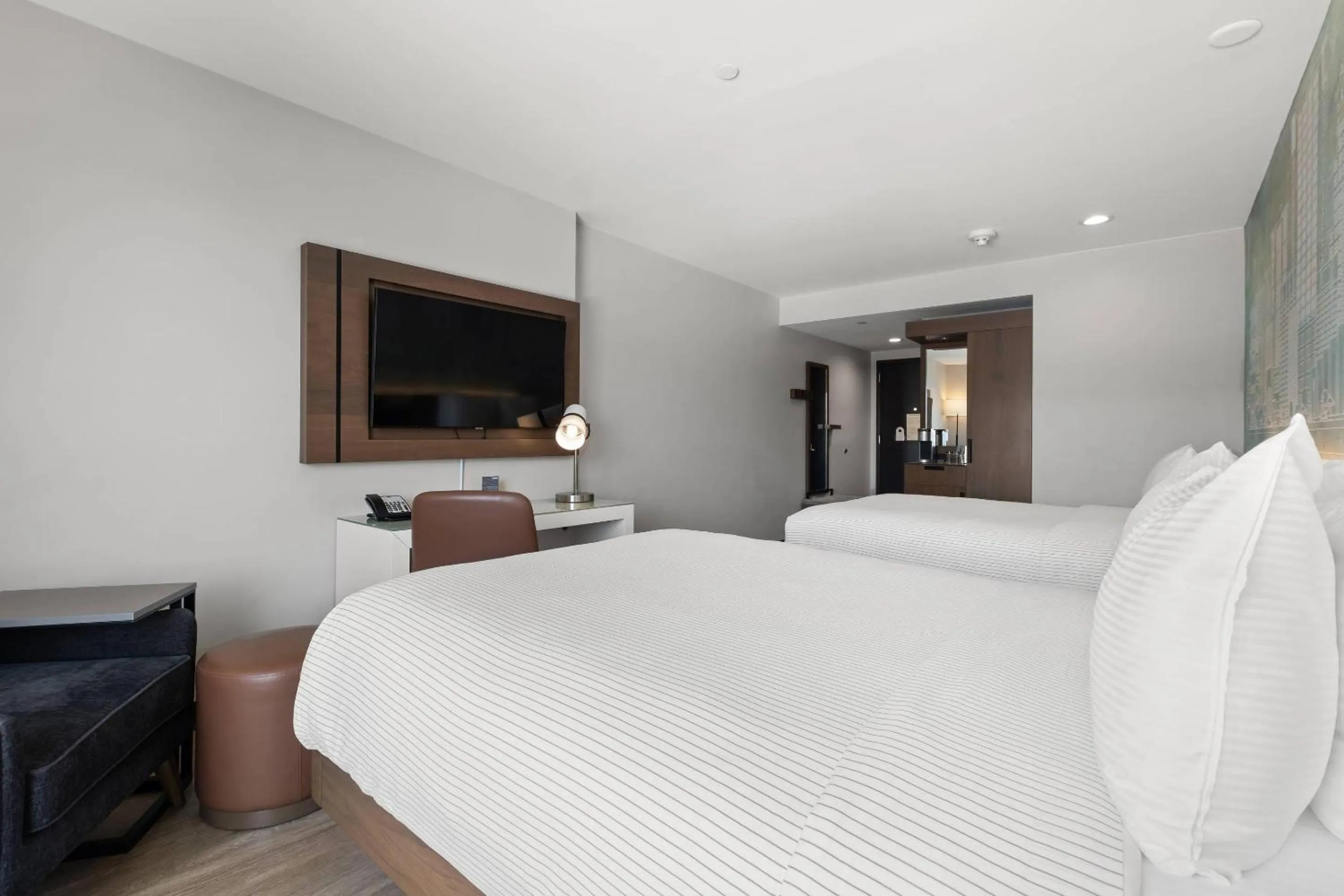 Bedroom, Bed in Cambria Hotel Orlando near Universal Theme Parks