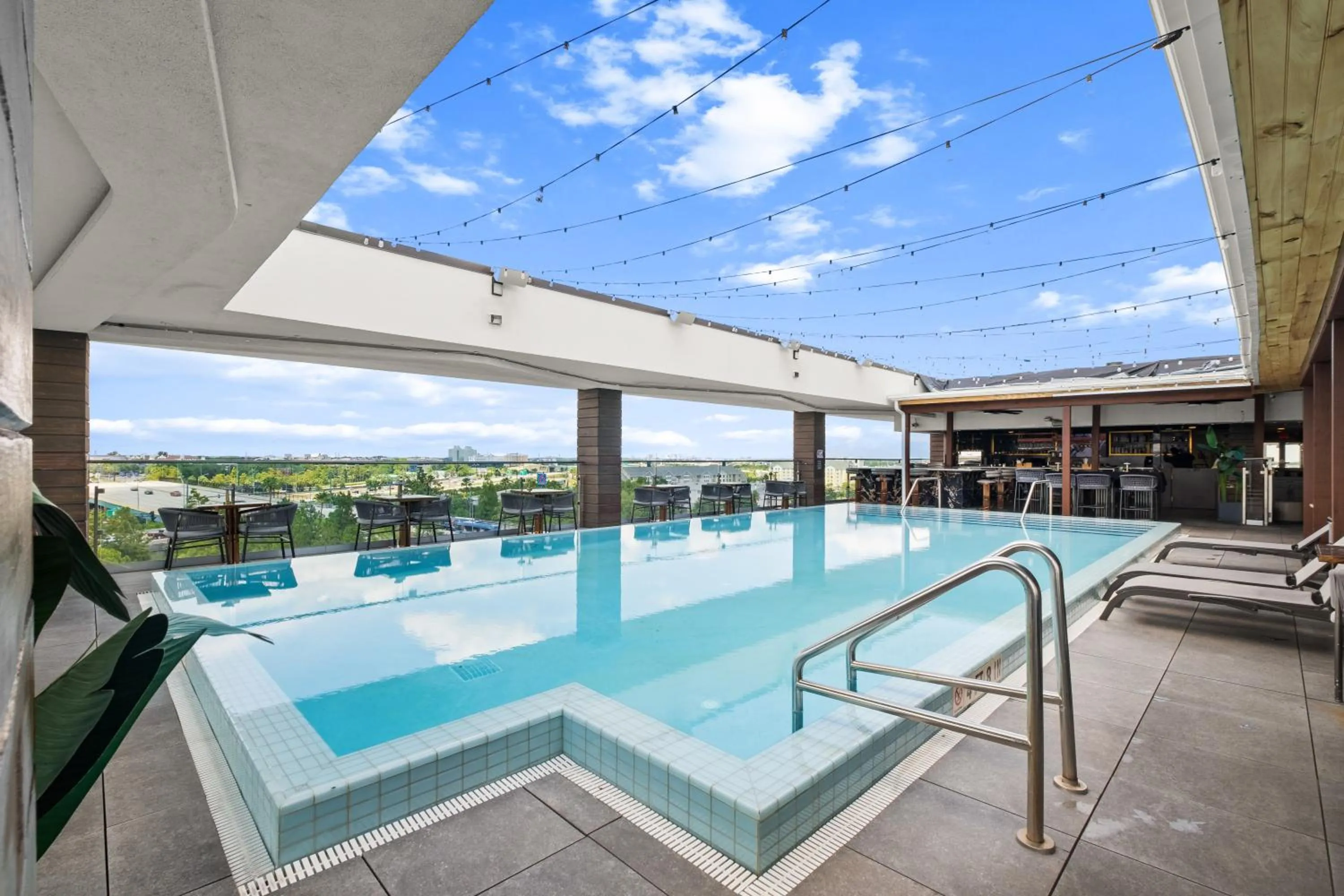 Swimming pool in Cambria Hotel Orlando near Universal Theme Parks