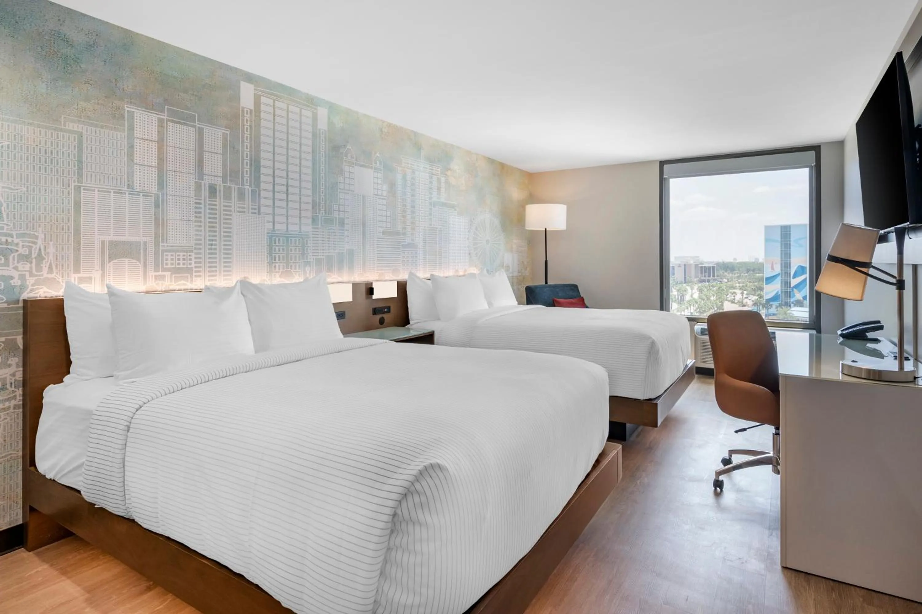 Bed in Cambria Hotel Orlando near Universal Theme Parks