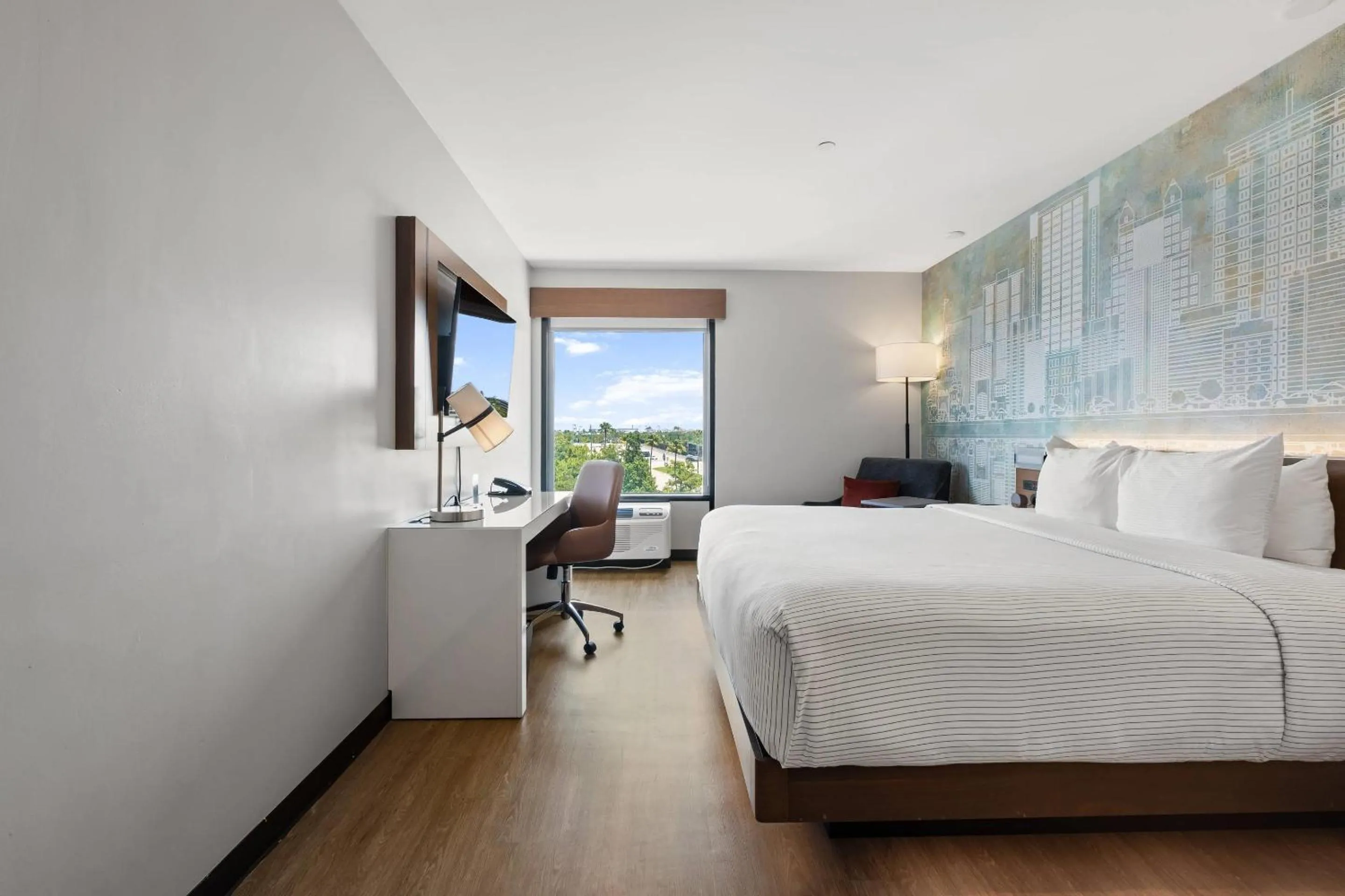 Bedroom, Bed in Cambria Hotel Orlando near Universal Theme Parks