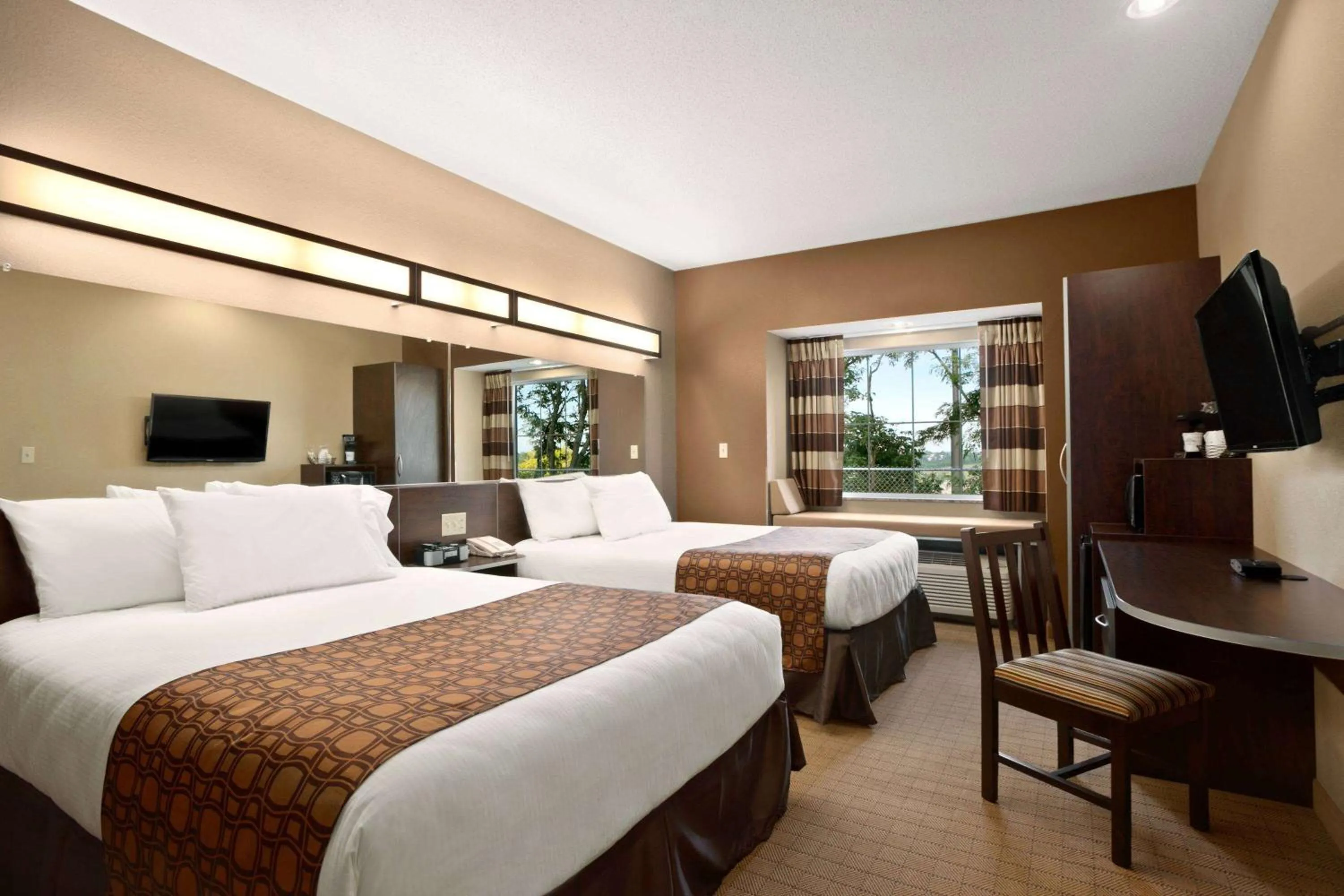 Photo of the whole room, Bed in Microtel Inn & Suites by Wyndham St Clairsville - Wheeling