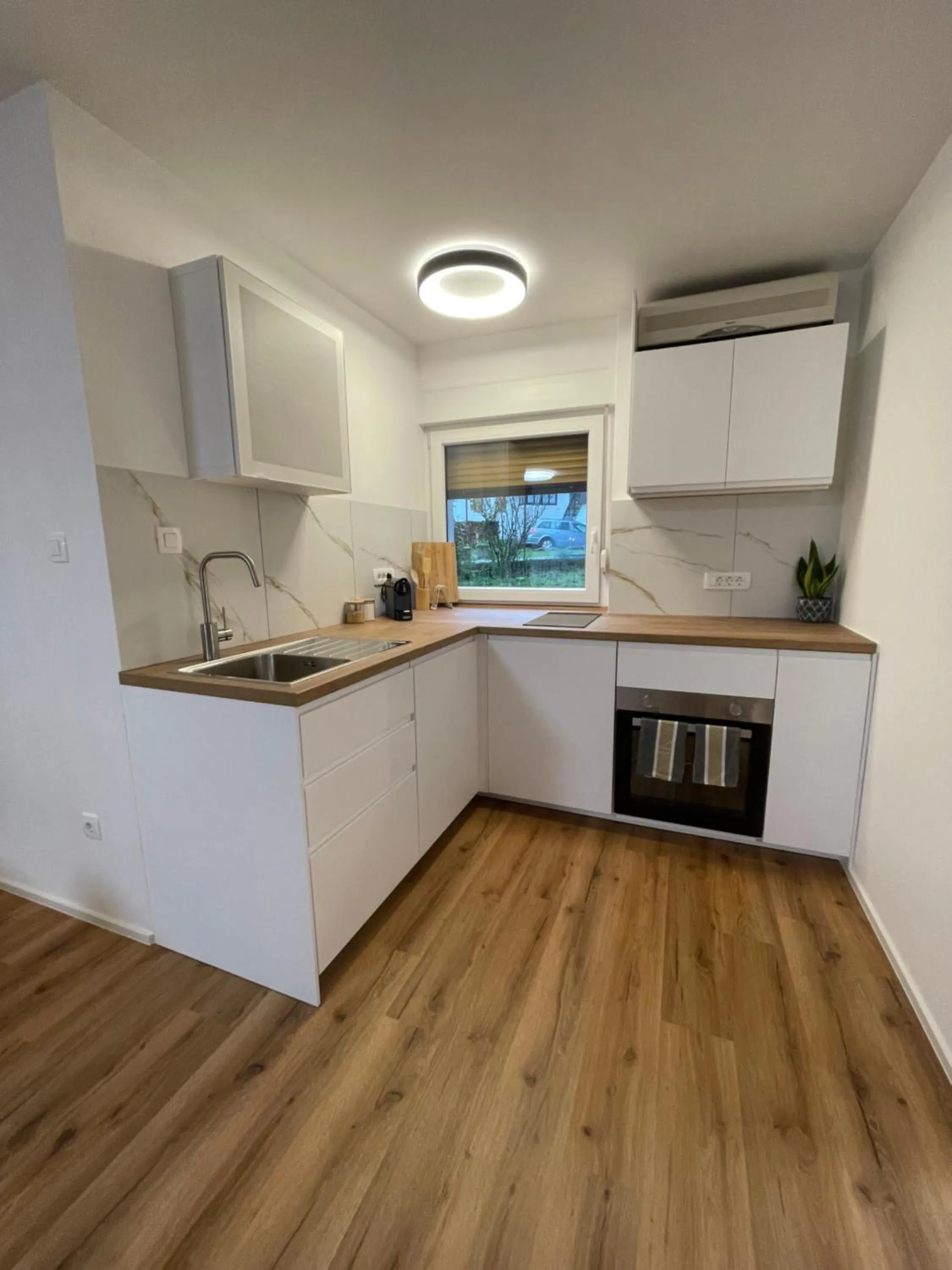 Kitchen or kitchenette in Apartma Guide 360