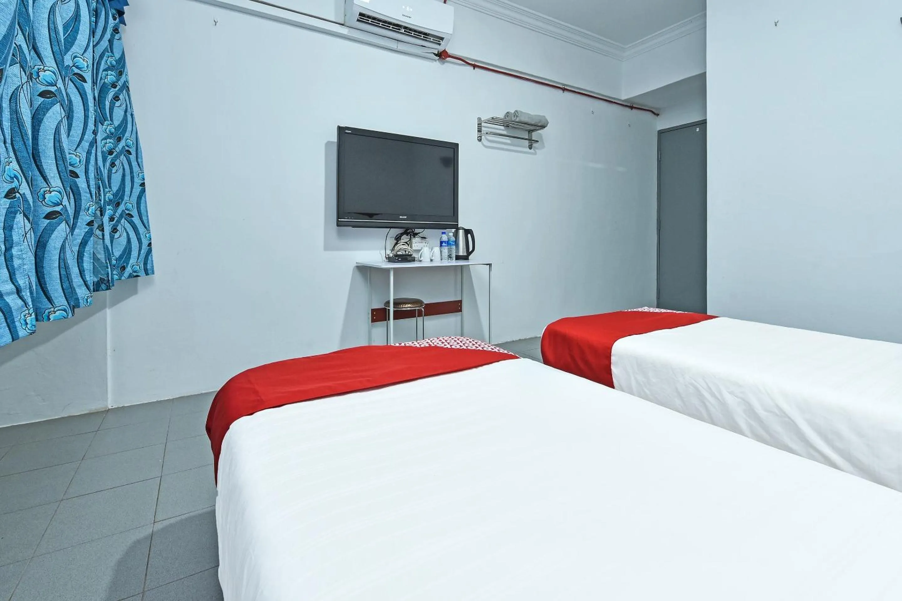 Bedroom in OYO 90544 M&h Hotel