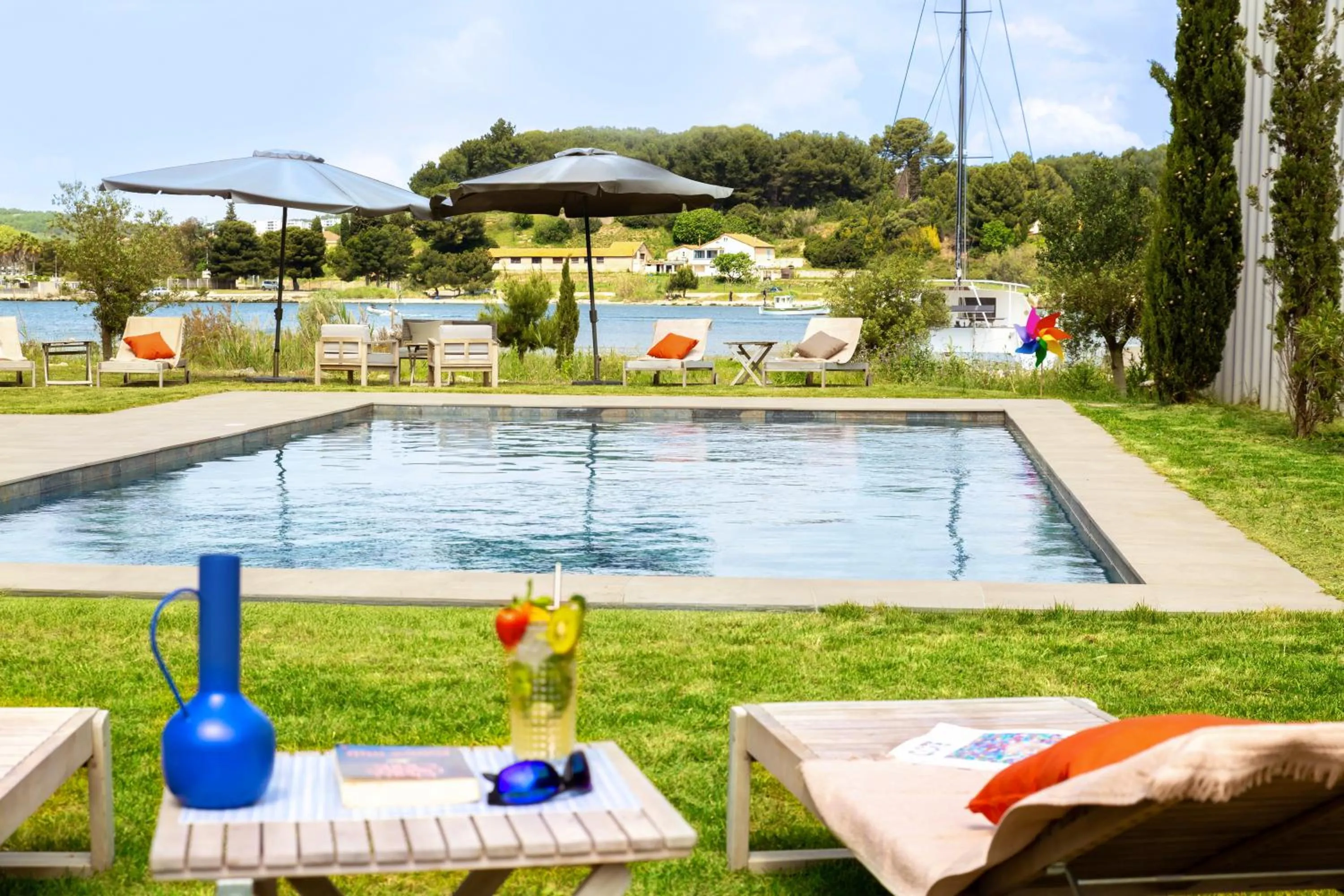 Swimming pool in Golden Tulip Hotel & Rooftop Martigues Provence