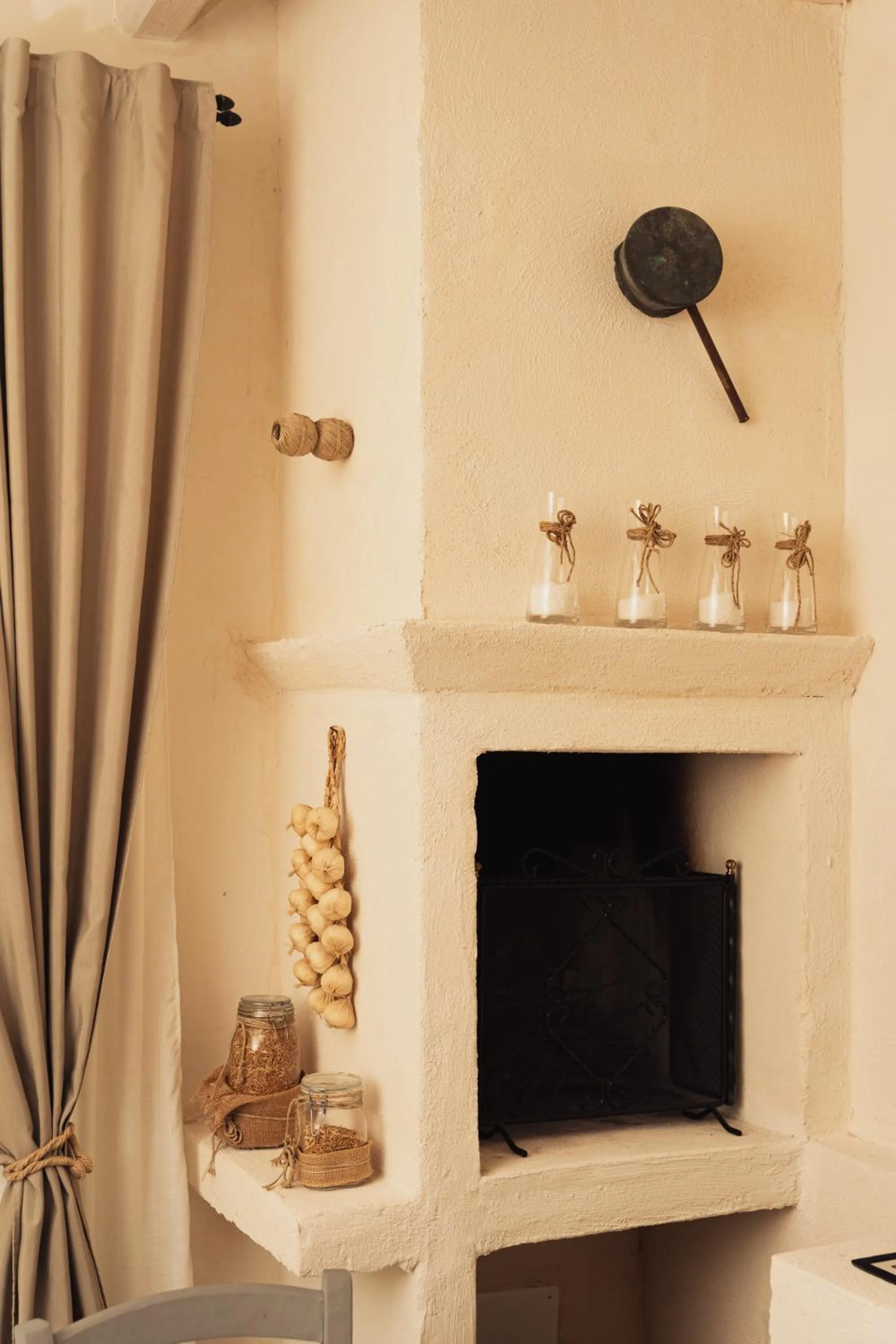 fireplace in Masseria Messapia Wine Resort & Spa Salento