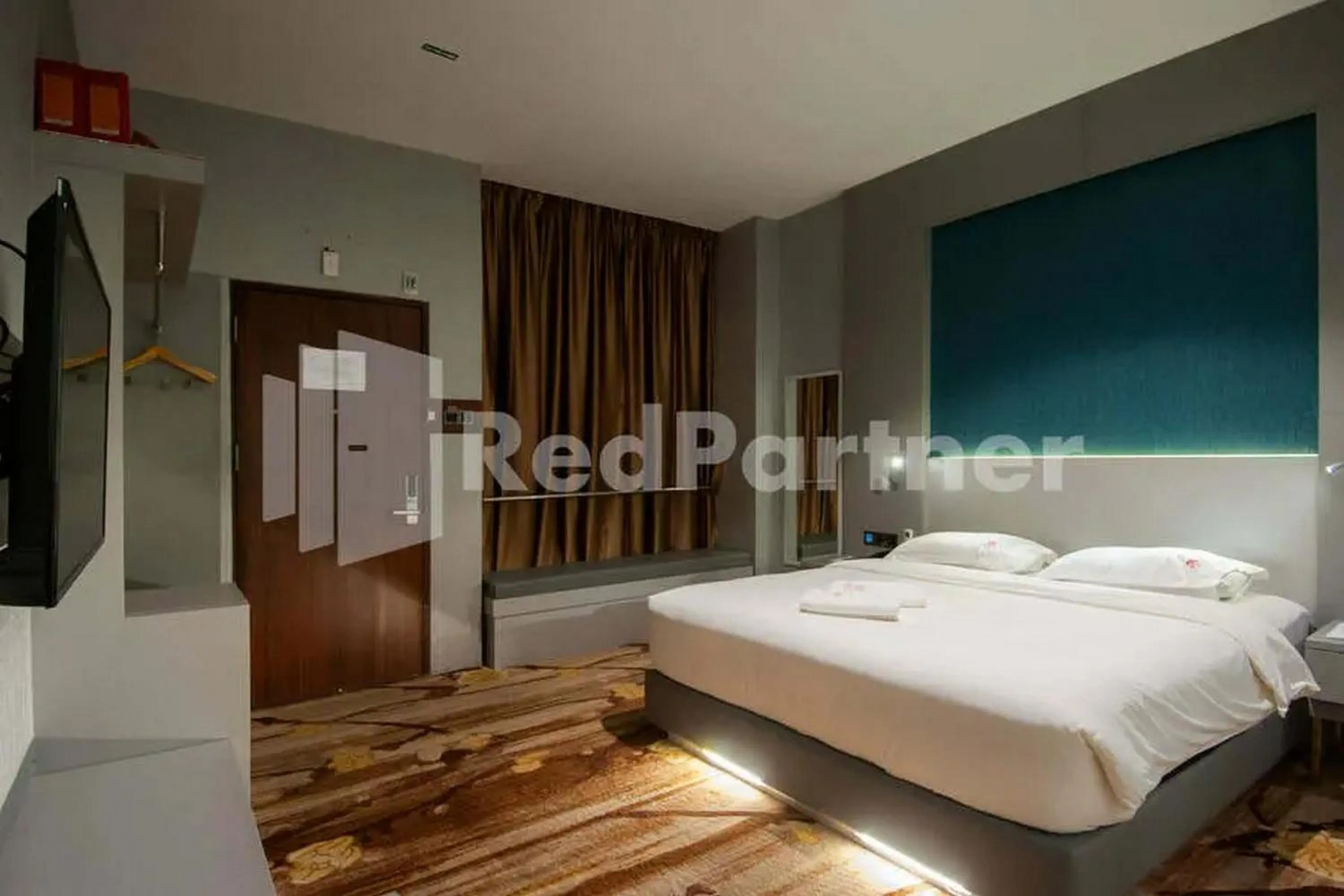 Bedroom, Bed in Selecta Hotel Medan Petisah R Signature Mitra RedDoorz