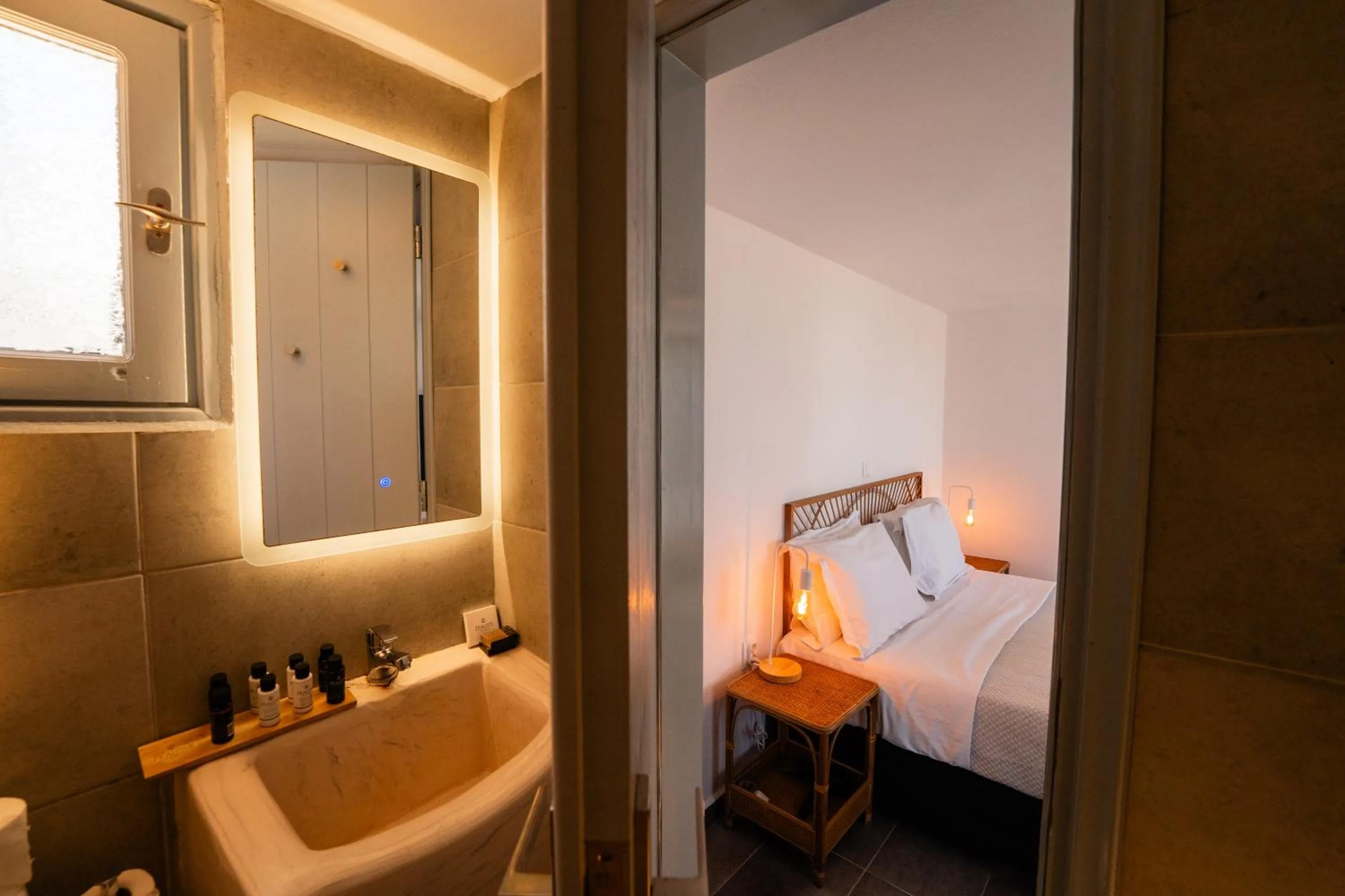 Bed in Divino Suites