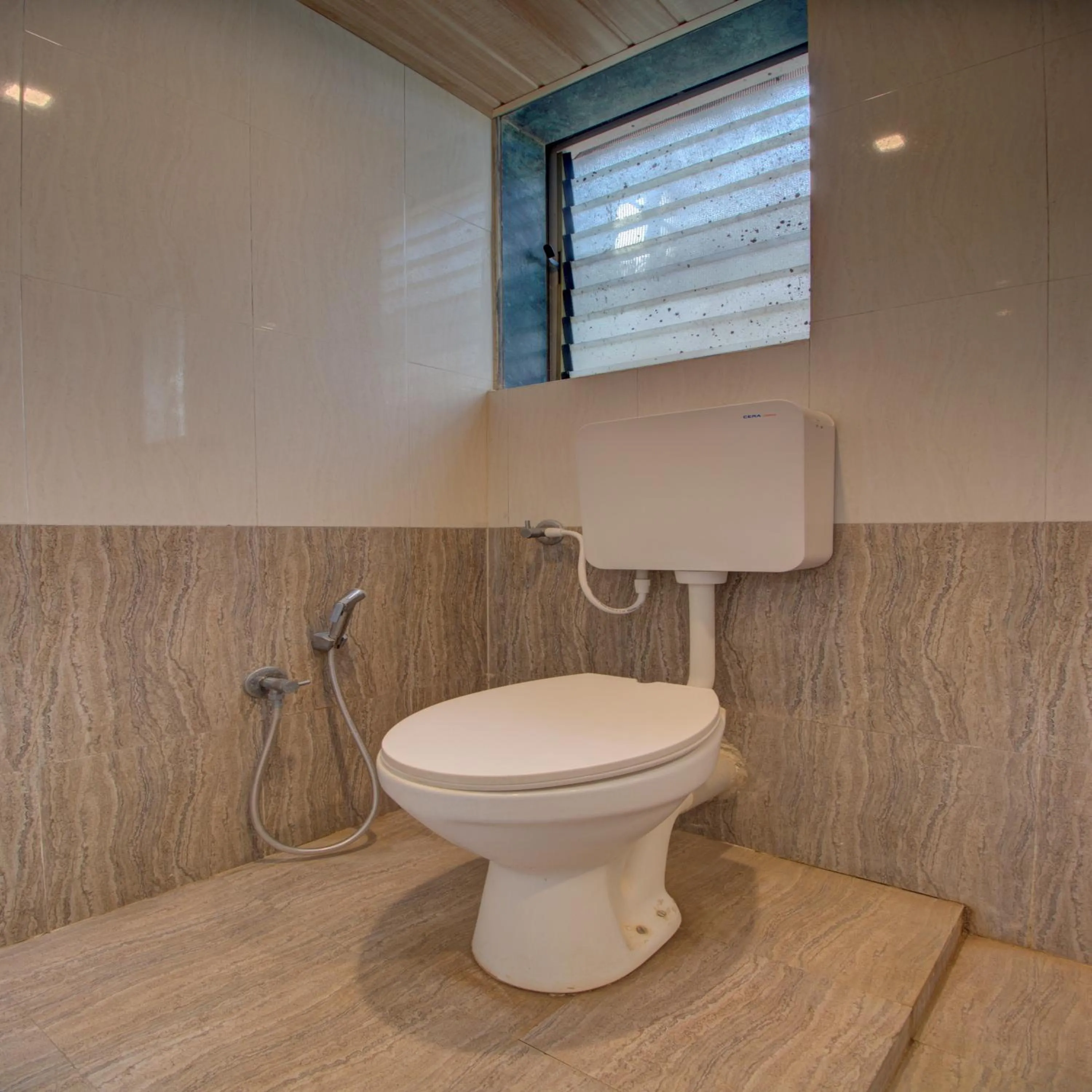 Bathroom in Hotel Snehaprabha - Near to Nagaon Beach Alibaug