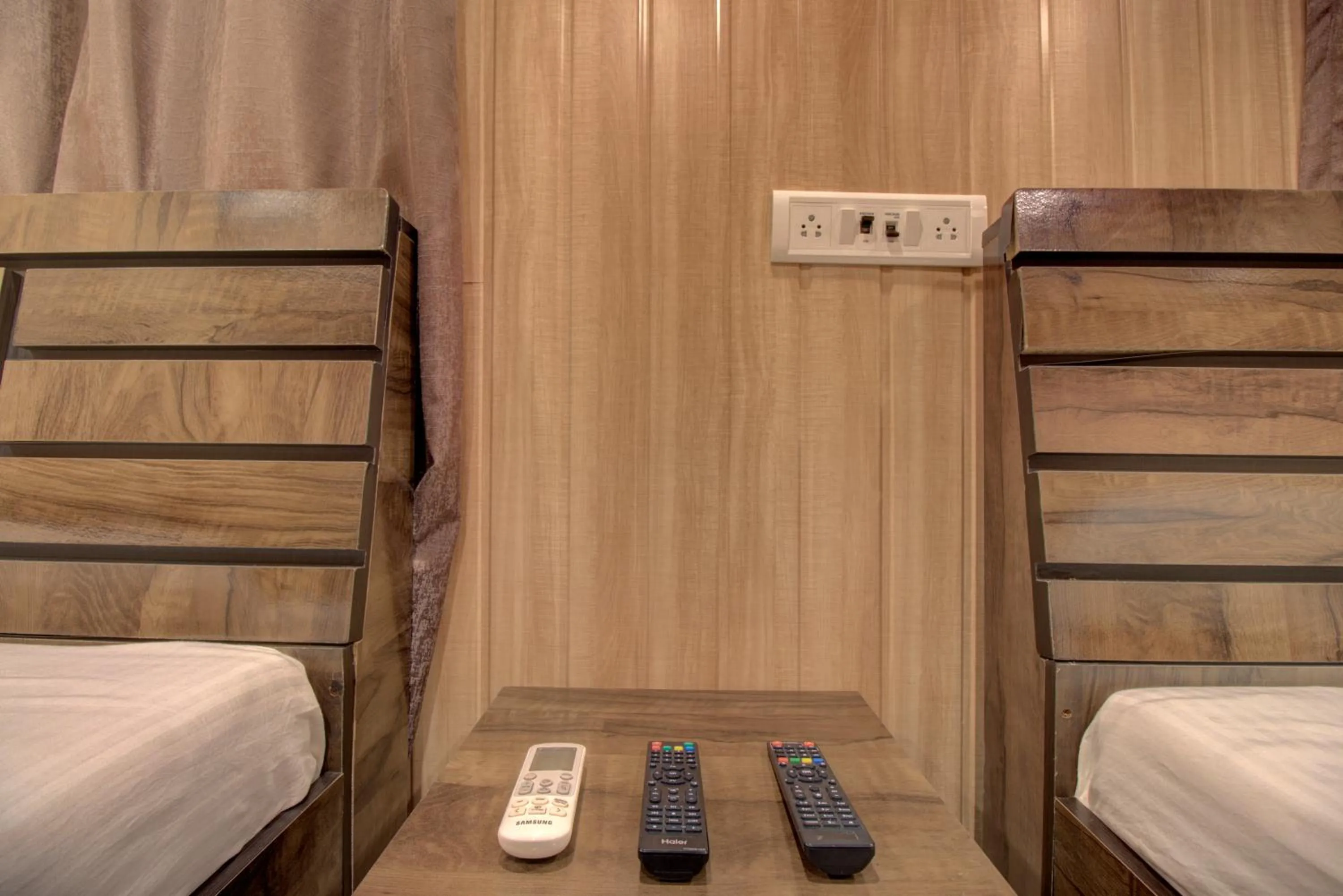 TV and multimedia, Bed in Hotel Snehaprabha - Near to Nagaon Beach Alibaug