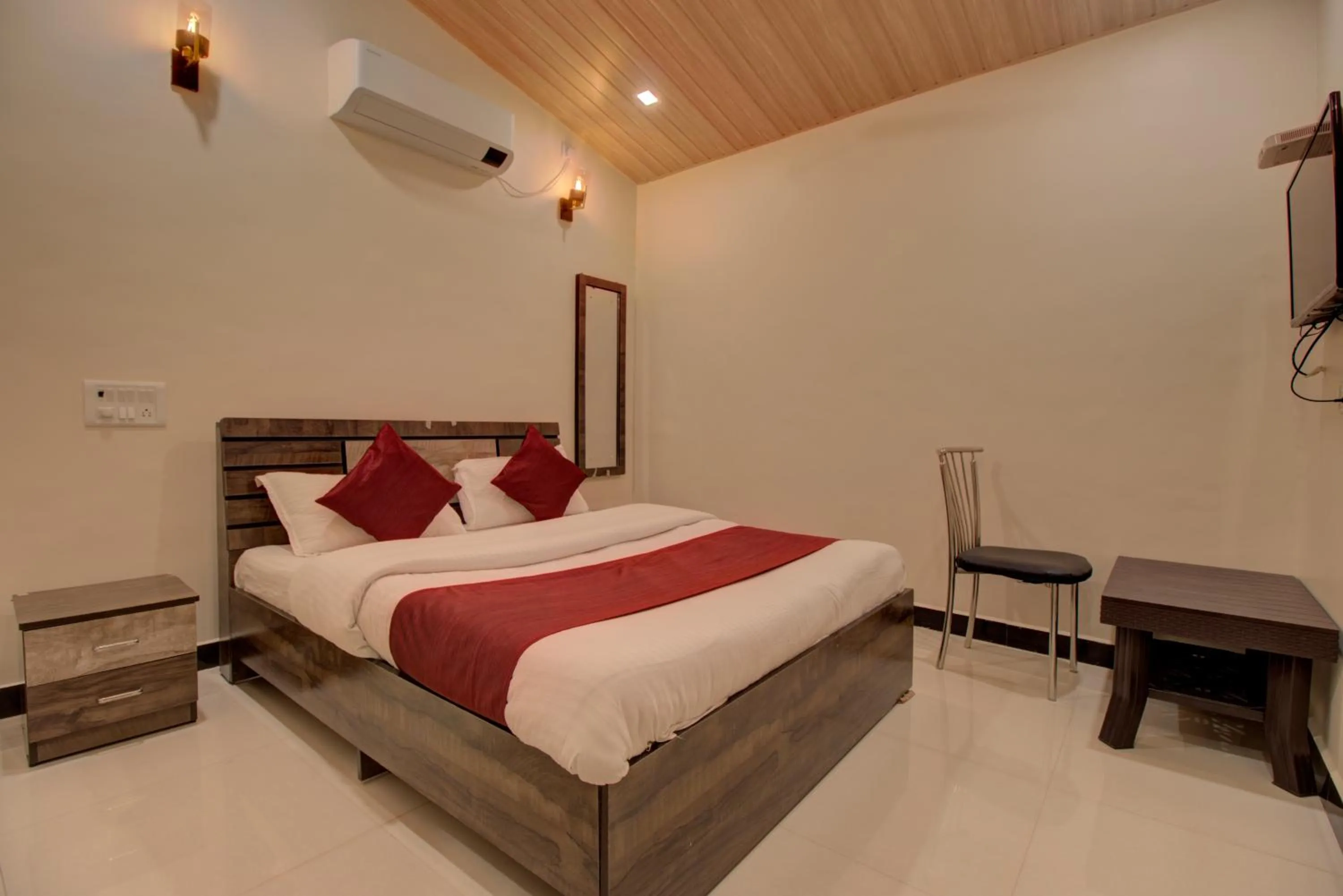 Photo of the whole room, Bed in Hotel Snehaprabha - Near to Nagaon Beach Alibaug