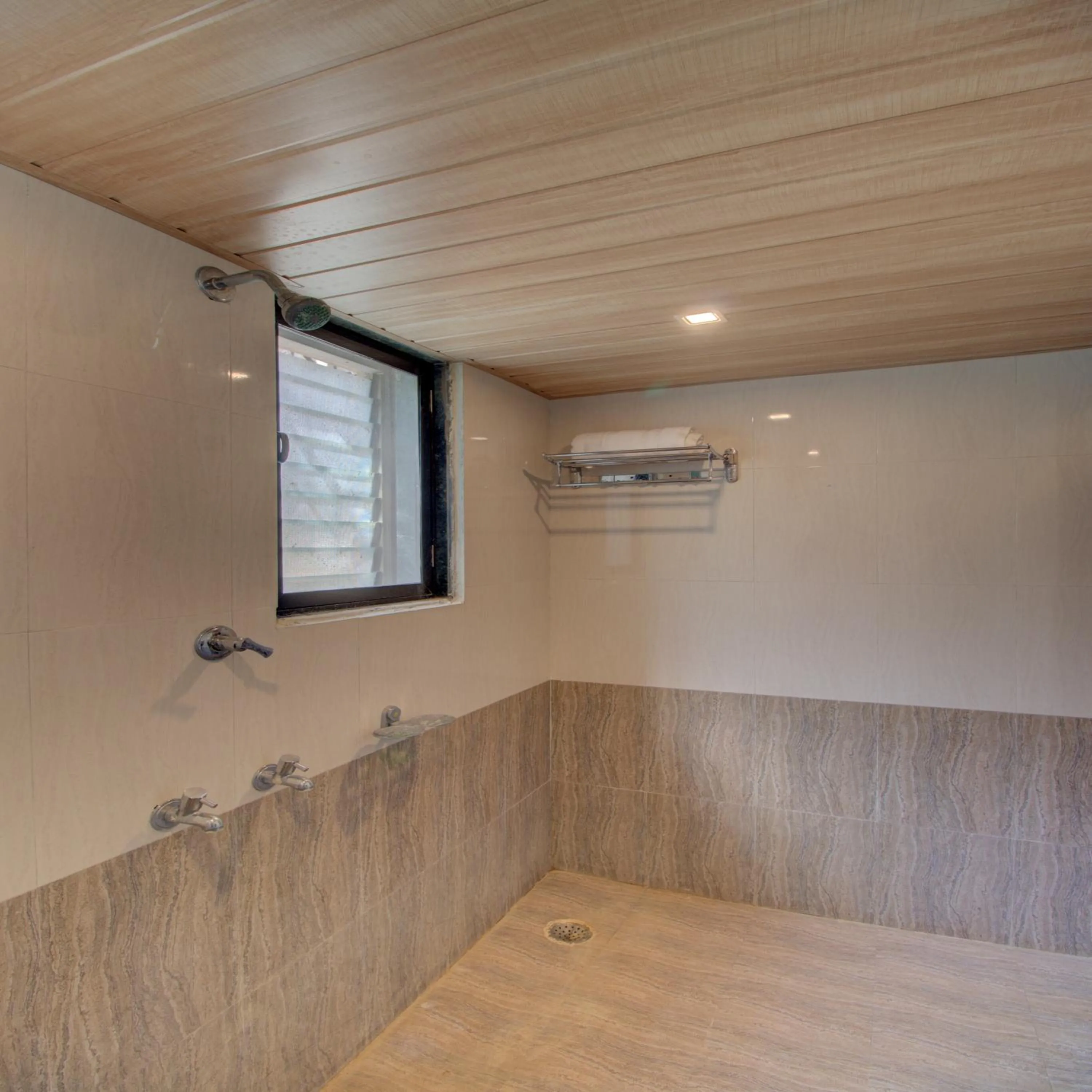 Shower in Hotel Snehaprabha - Near to Nagaon Beach Alibaug