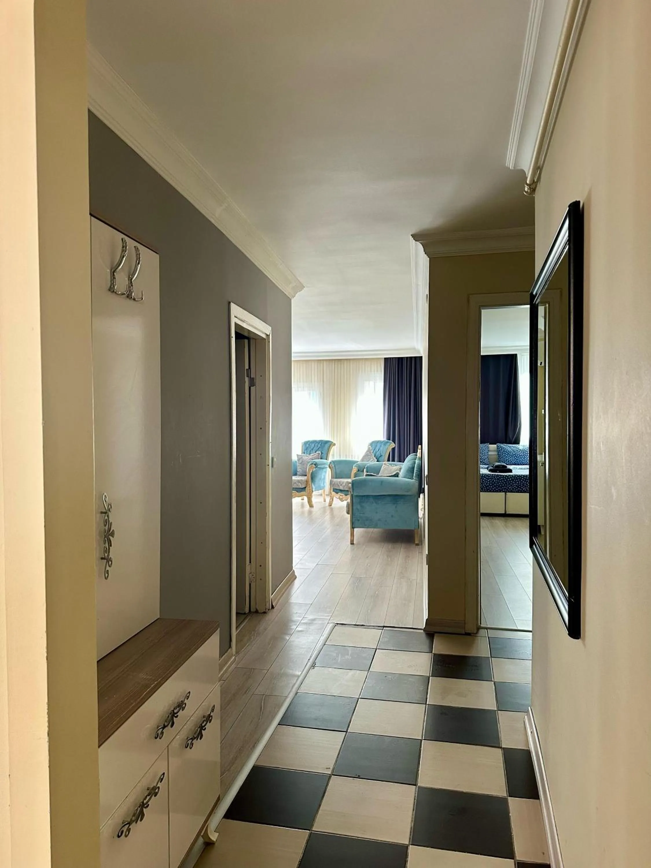 Living room, Bed in Blueway Hotel Residence